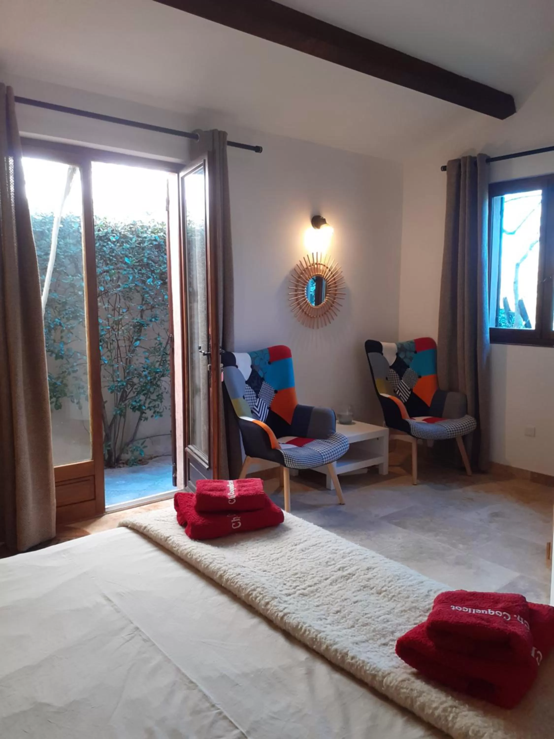 Photo of the whole room in La Sapiniére -chambres climatisées