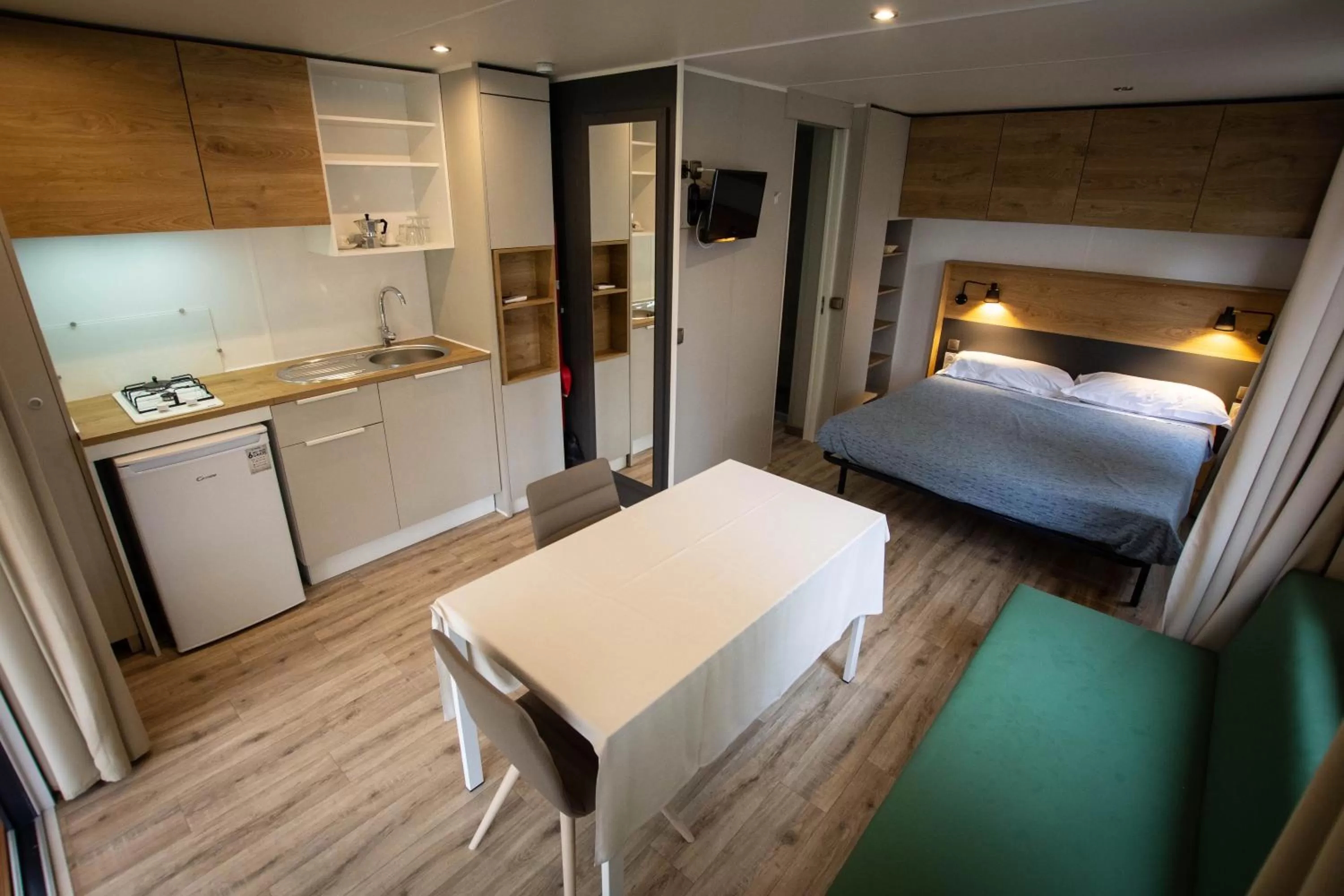 Bed in Albavillage Rooms & Camping