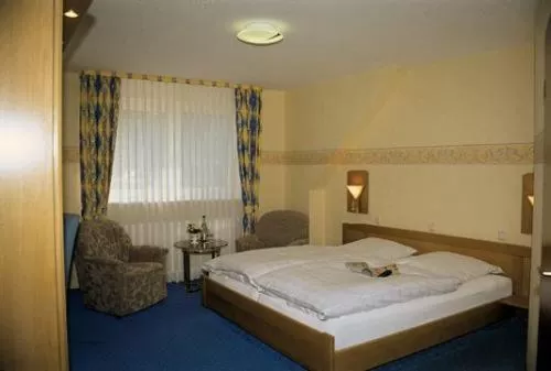 Bed in Hotel-Restaurant Schmachtenbergshof