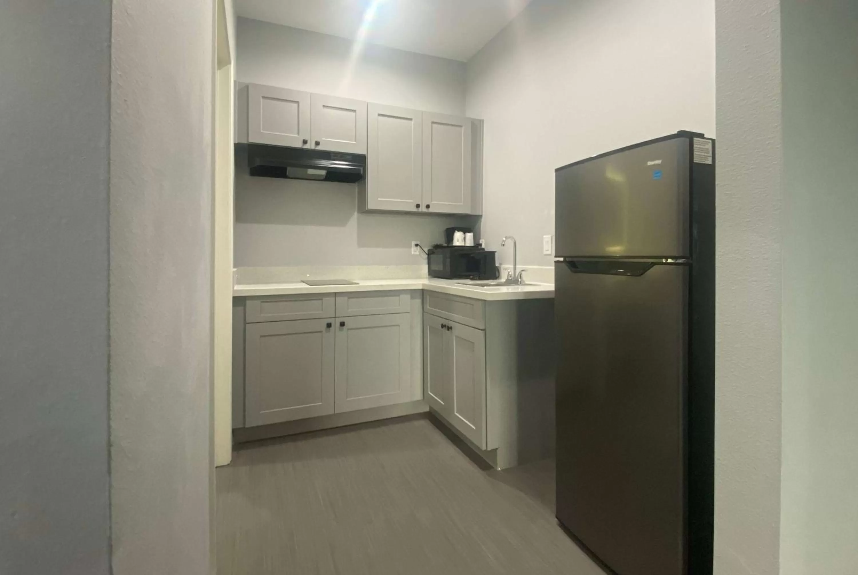 Kitchen or kitchenette in Baymont by Wyndham Freeport Texas