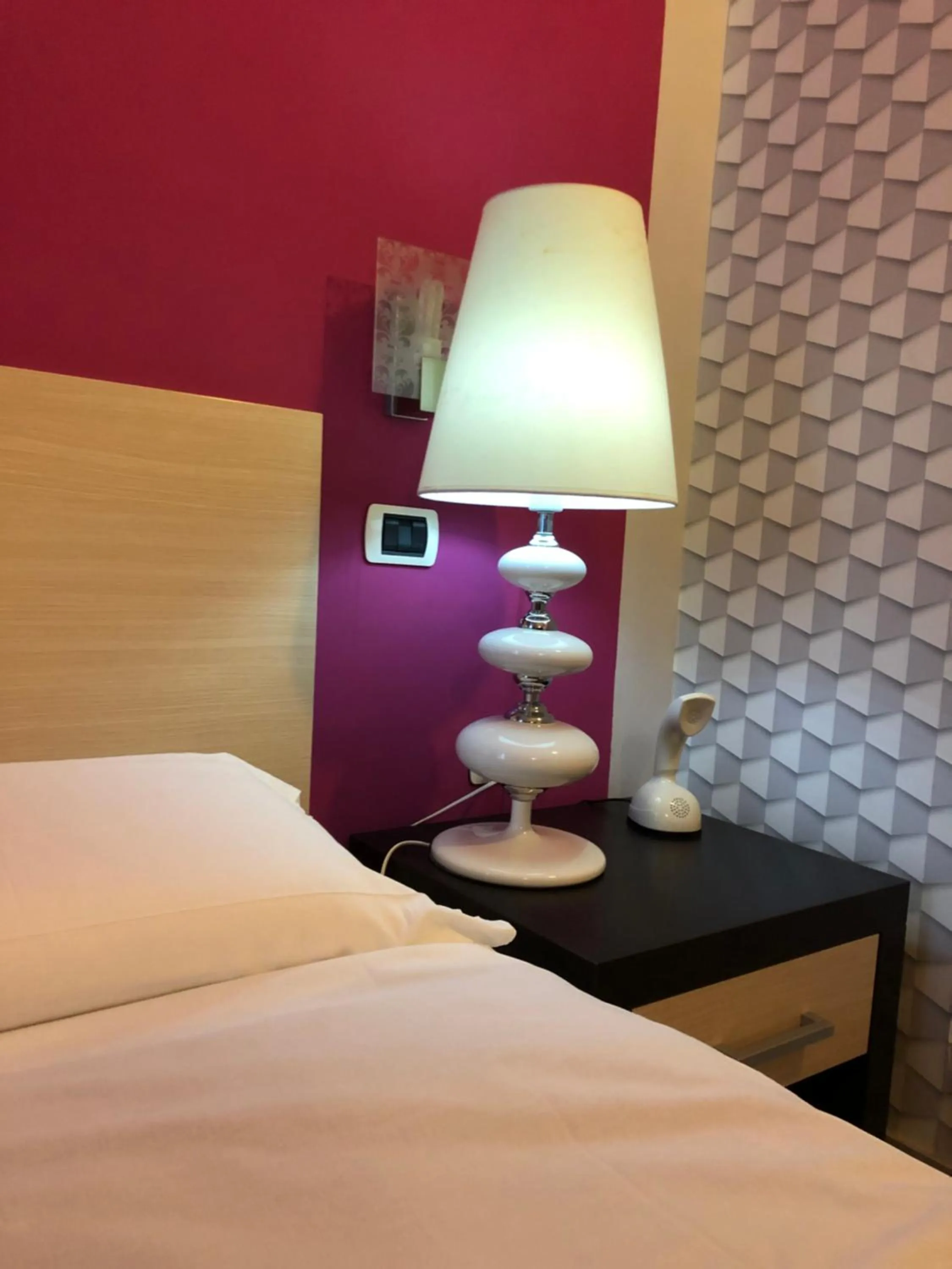 Bed in H Rooms boutique Hotel