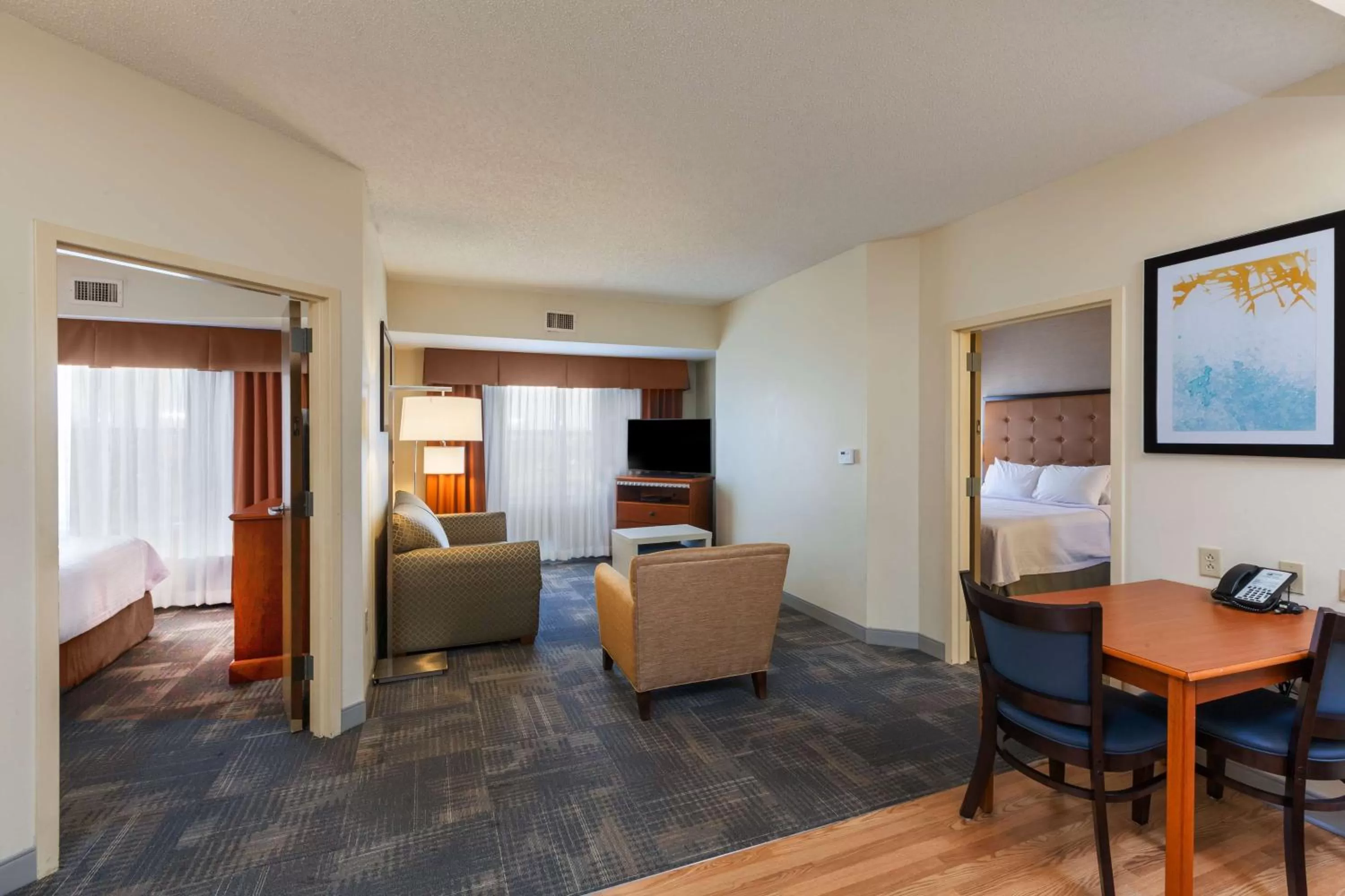 Living room, Bed in Homewood Suites by Hilton Brownsville