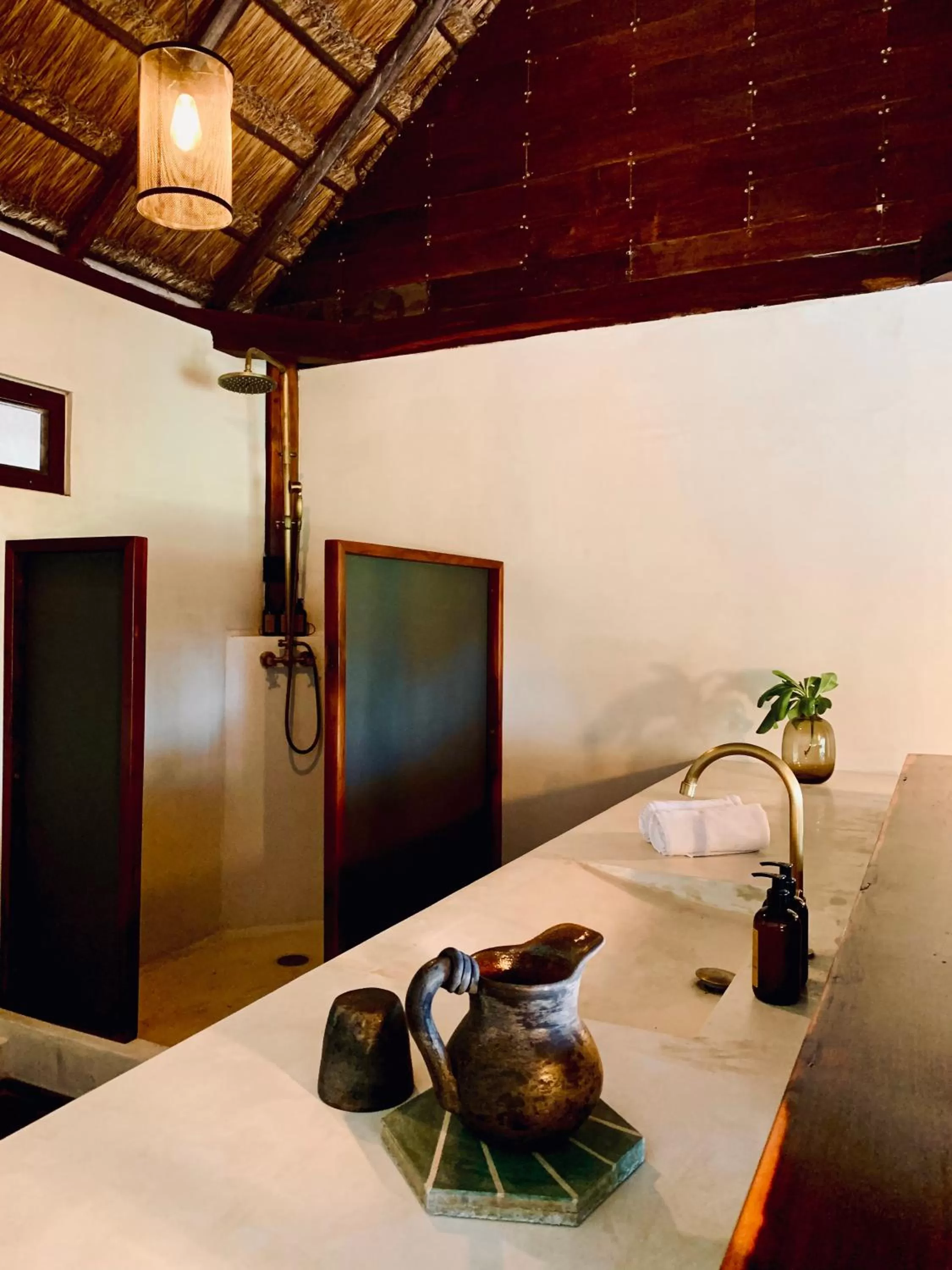 Bathroom in Libelula Tulum Beachfront Hotel