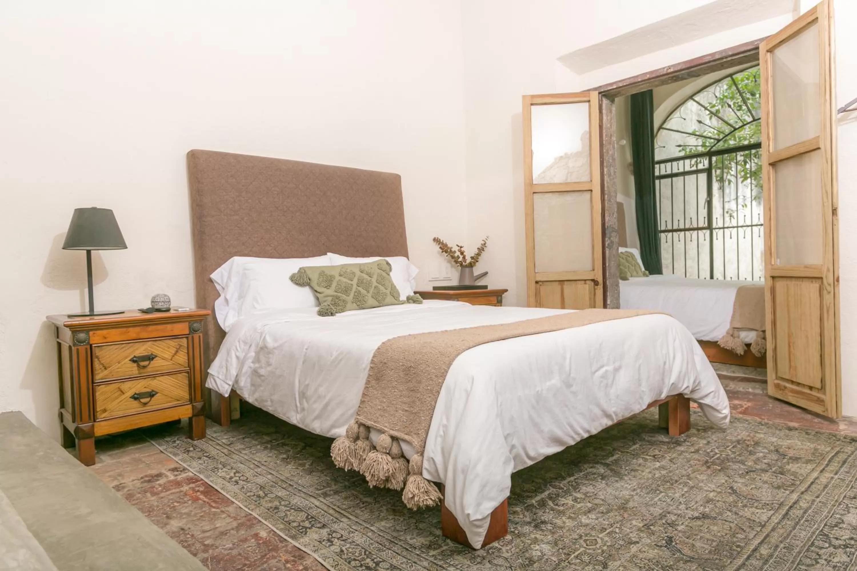 Bed in Orchid House San Miguel de Allende