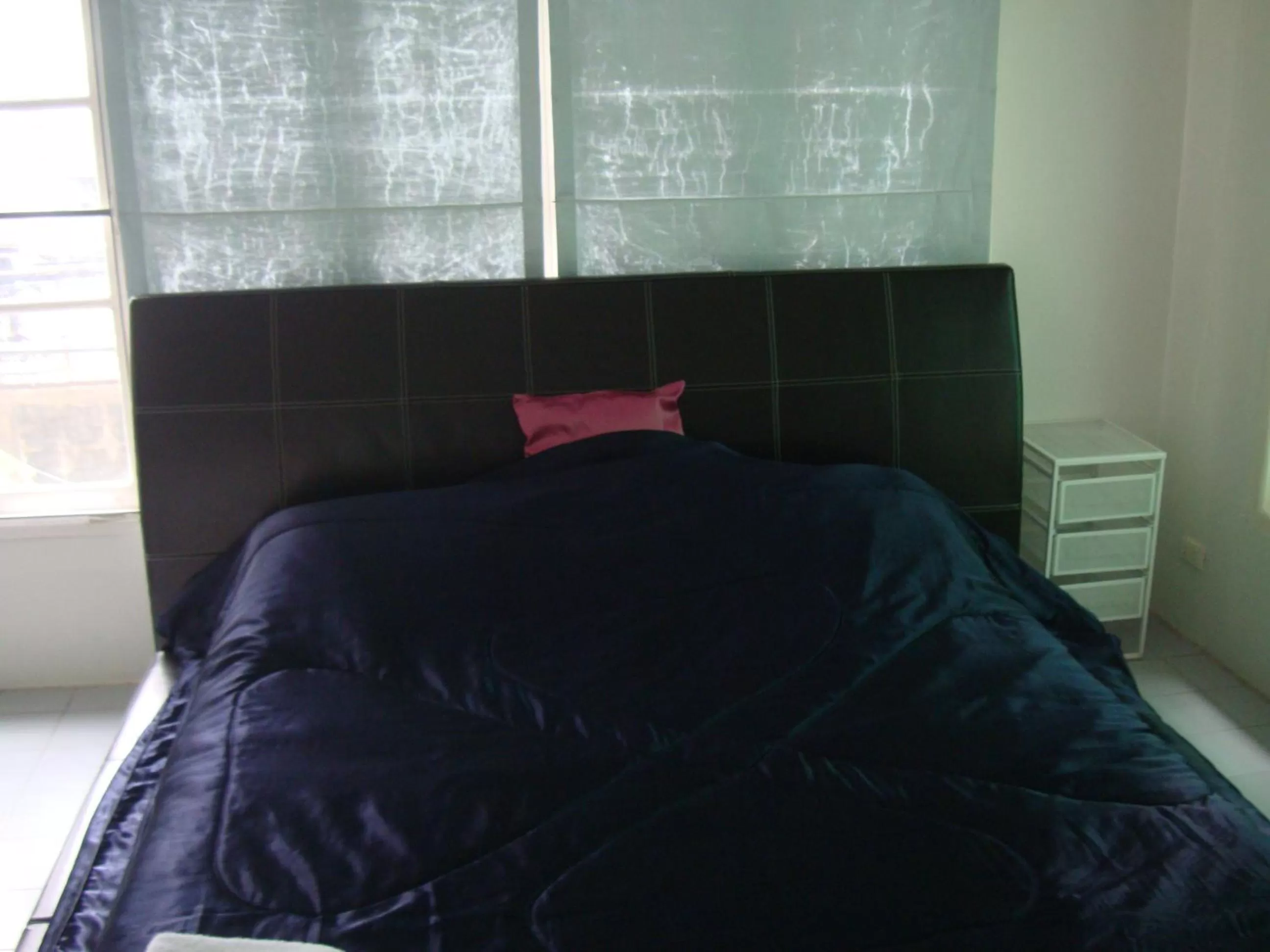 Bed in Oriental Smile Hotel