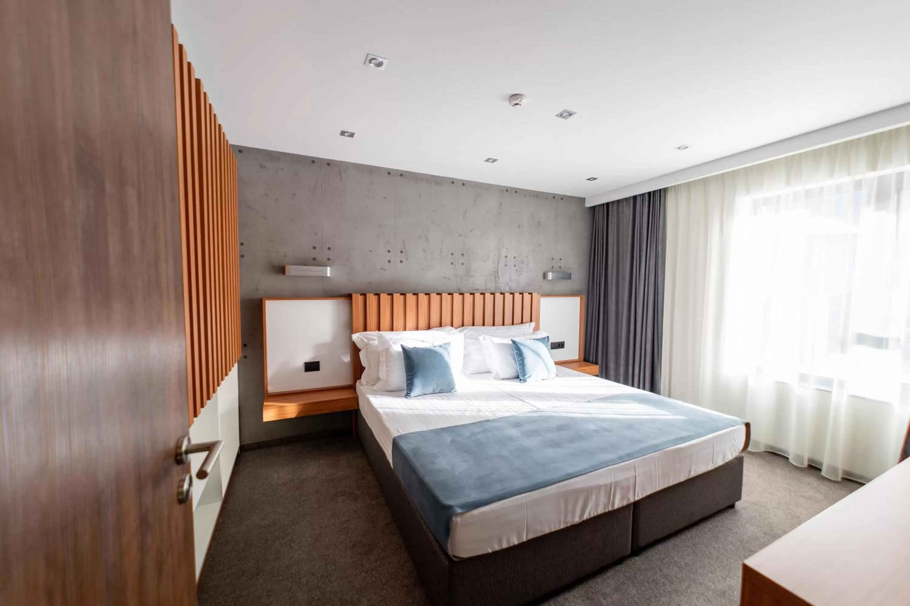 Bed in 103 Degrees Hotel & Spa