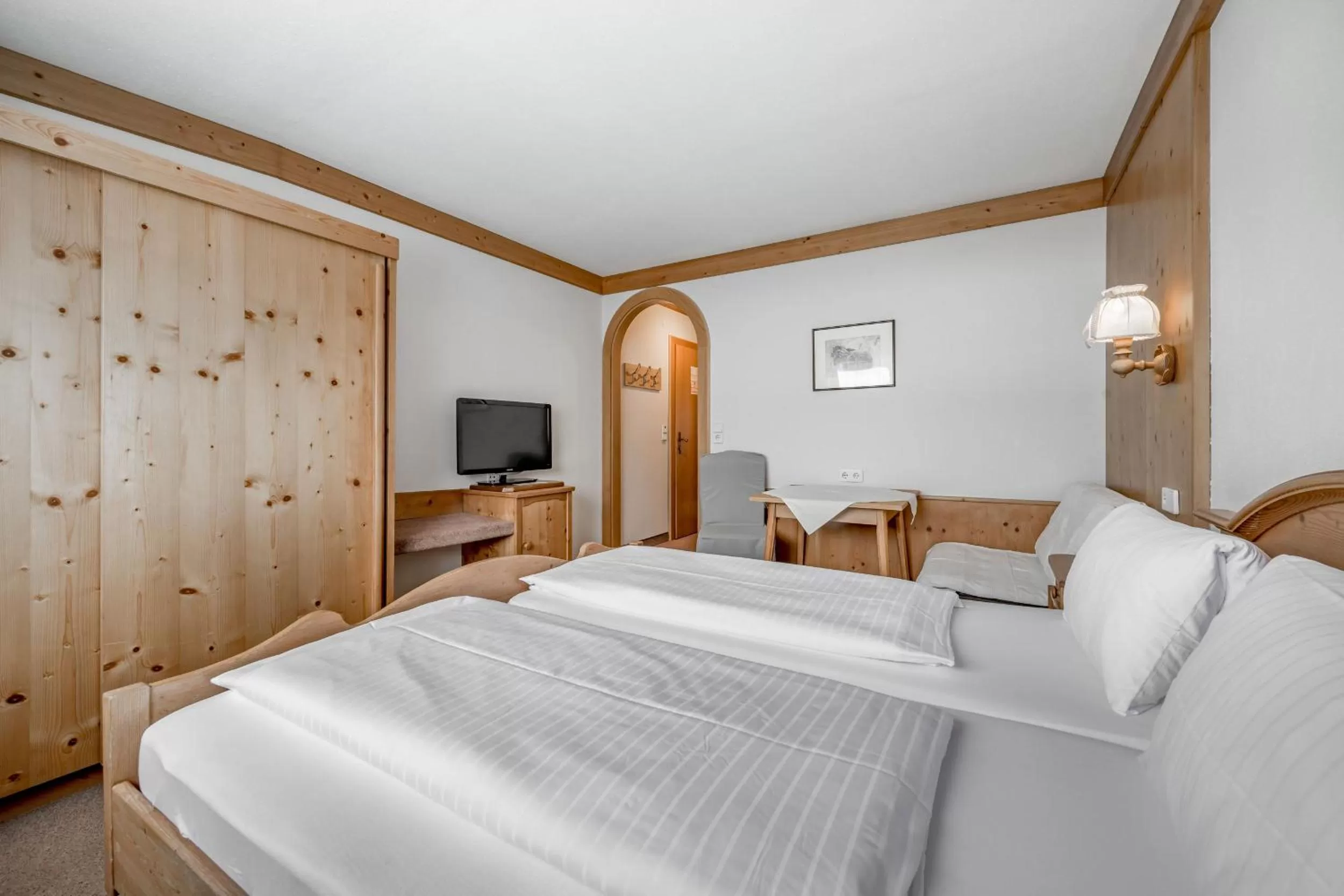 Photo of the whole room, Bed in Gasthof Schroll