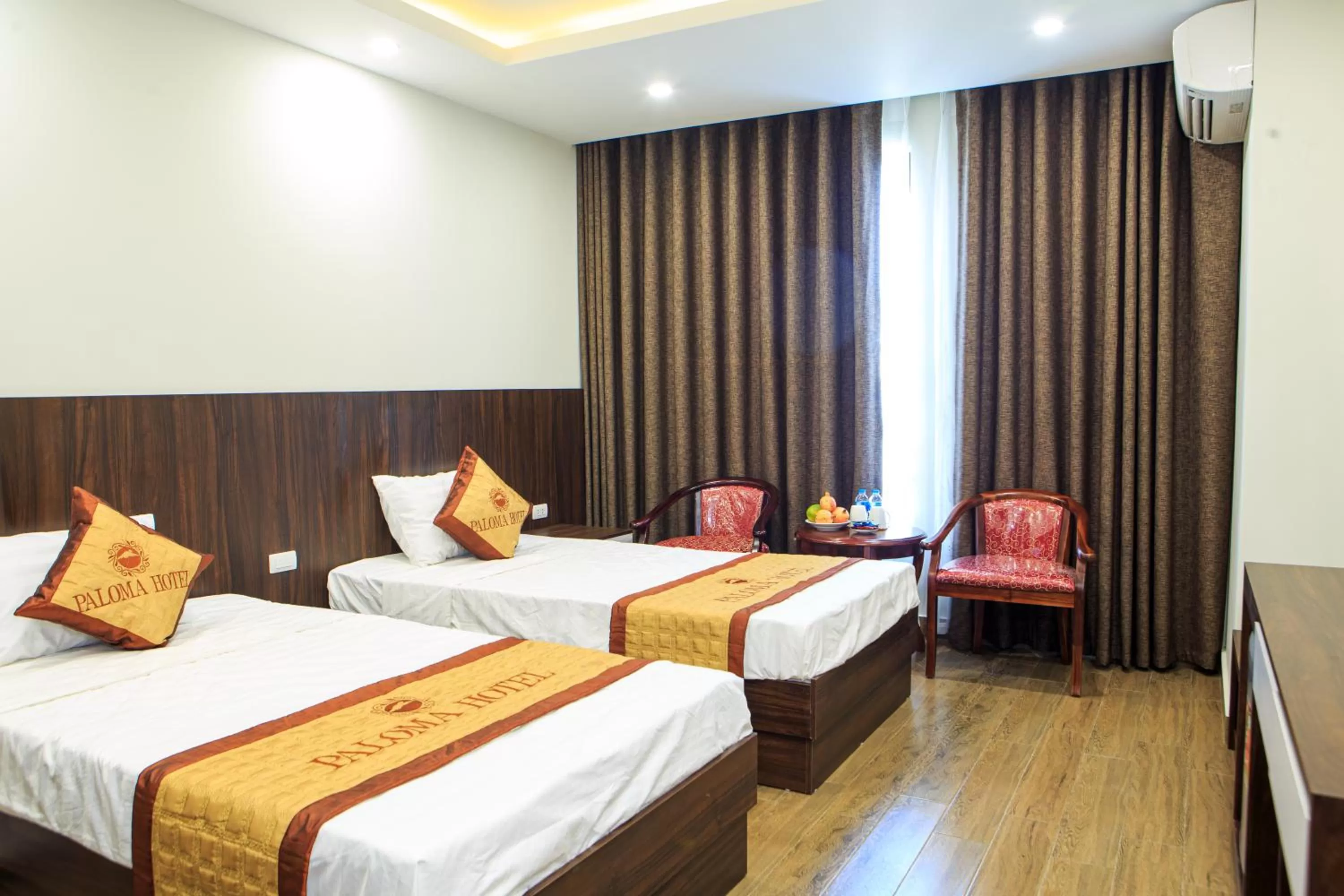 Bed in Paloma Hotel & Apartment