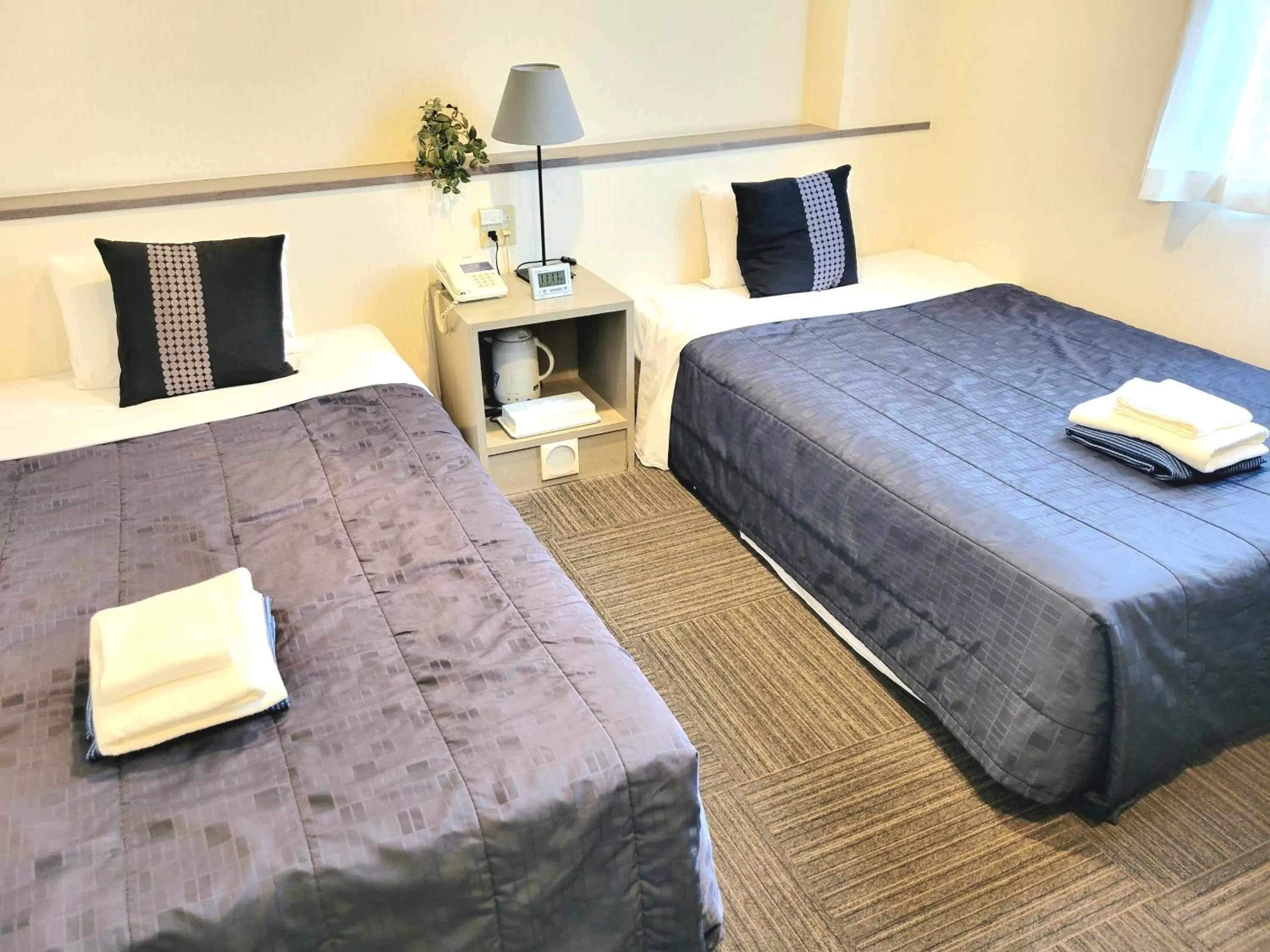 Bedroom, Bed in Saga City Hotel