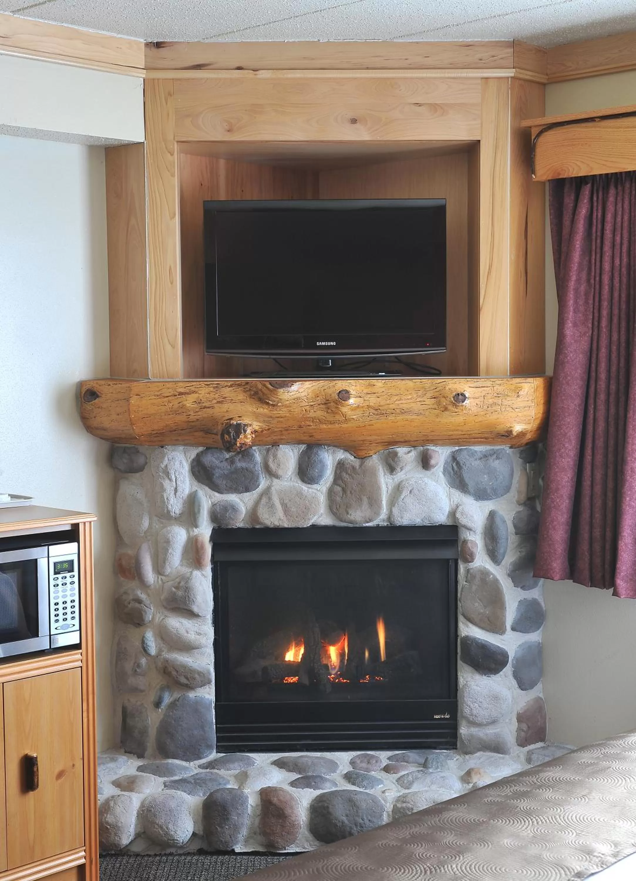 TV and multimedia in AmericInn by Wyndham Oswego