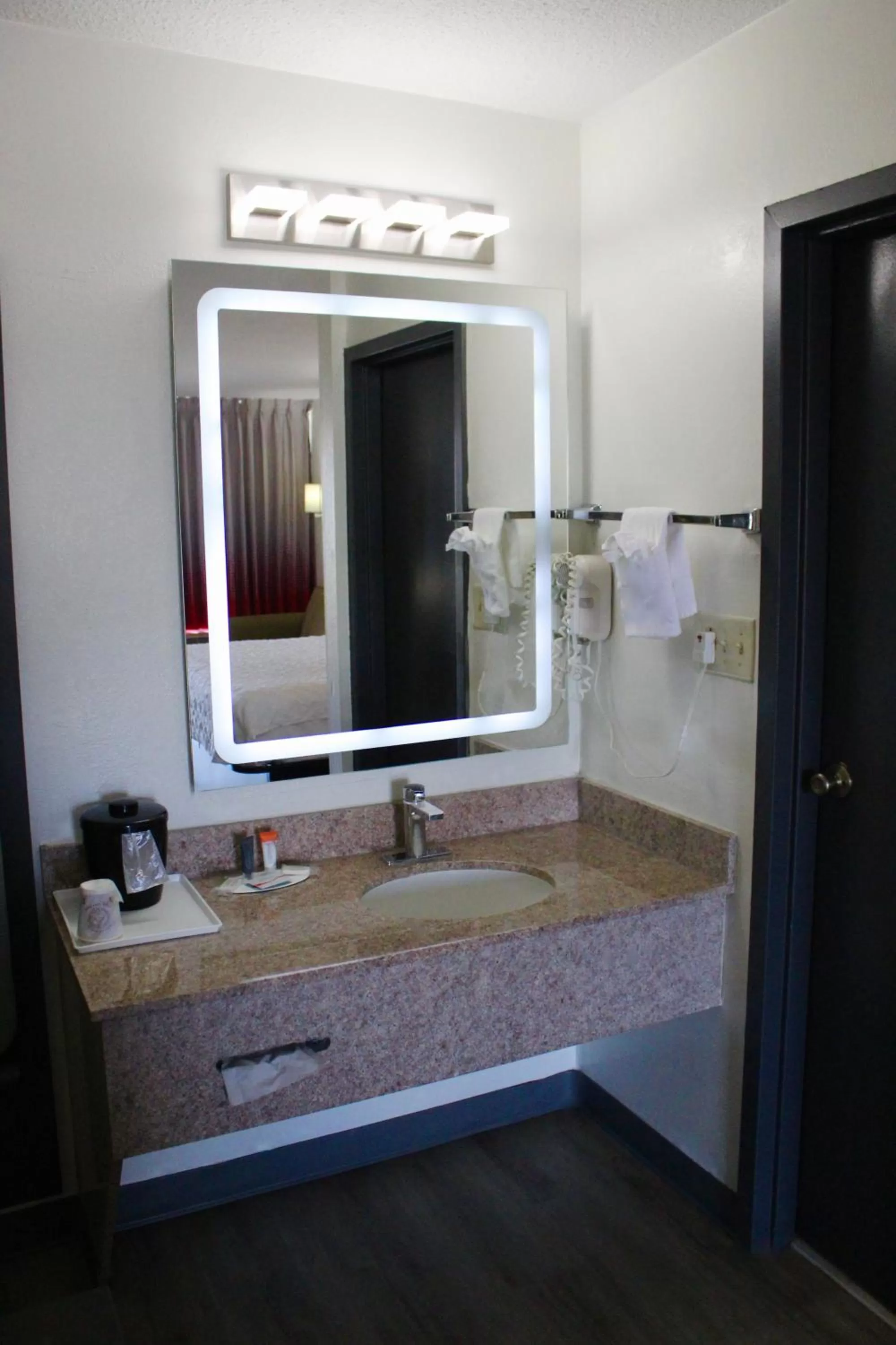 Bathroom in Ramada by Wyndham Harrisonburg