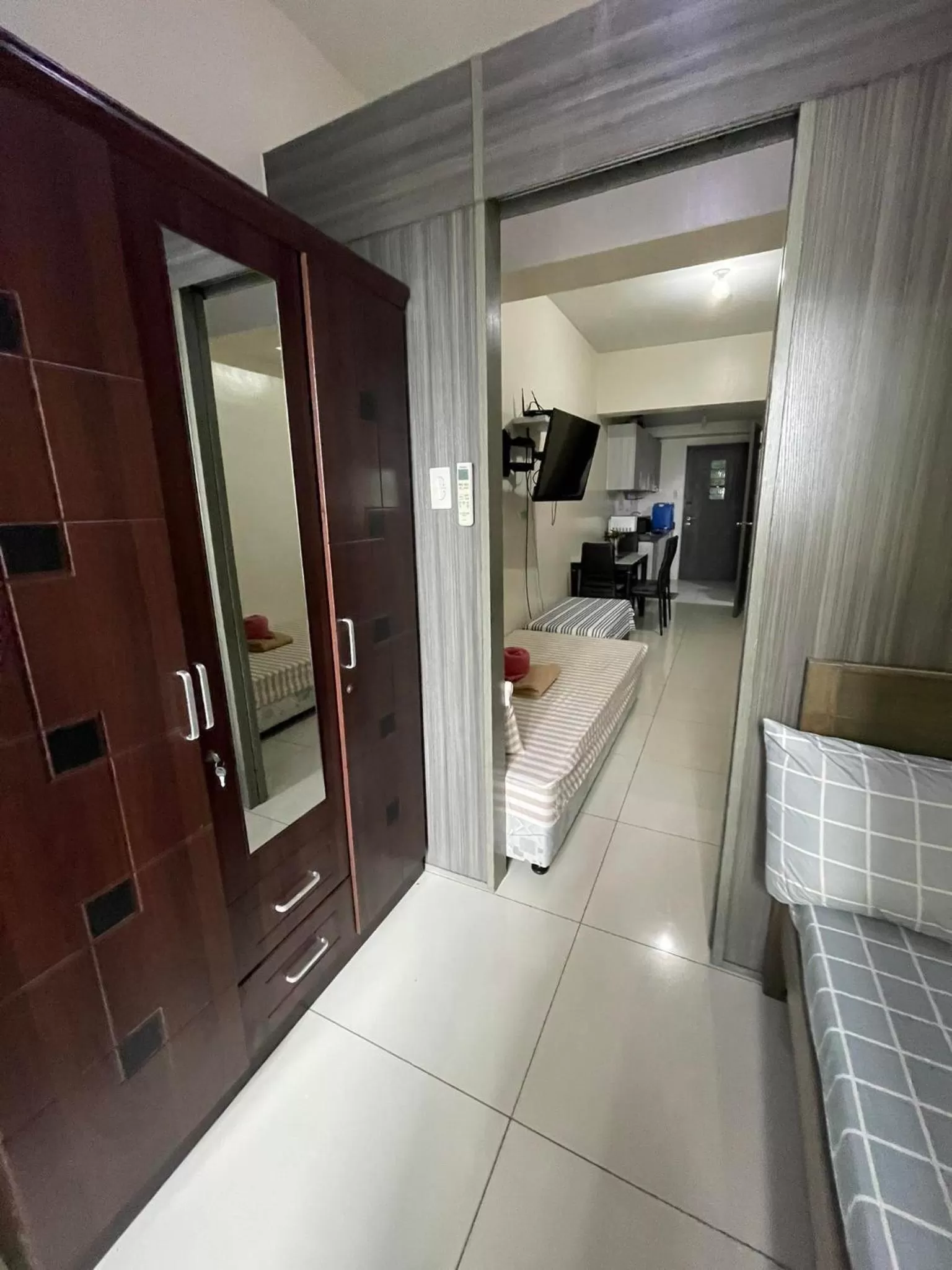 Bedroom, Kitchen/Kitchenette in Green Residences Staycation by PBYY