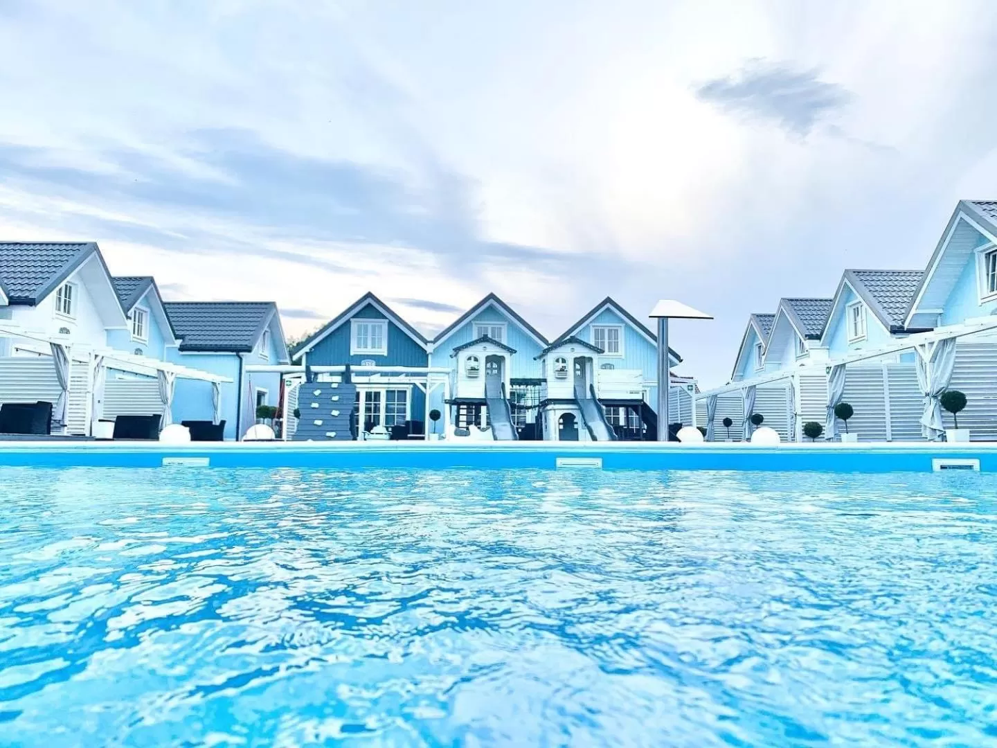 Children play ground, Swimming Pool in Baltic Family - domki całoroczne nad morzem basen kidsclub rowery