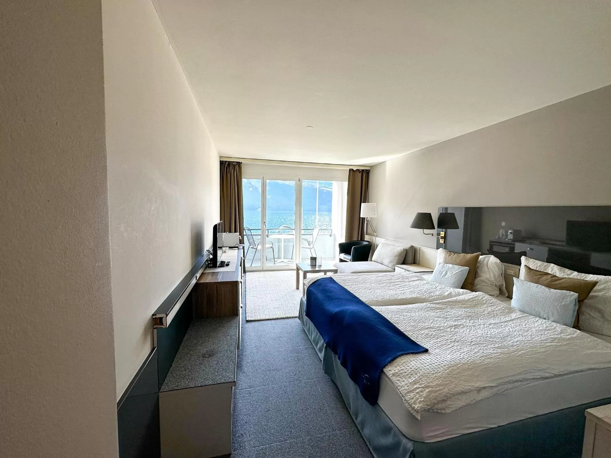 Bed in Seehotel Riviera at Lake Lucerne