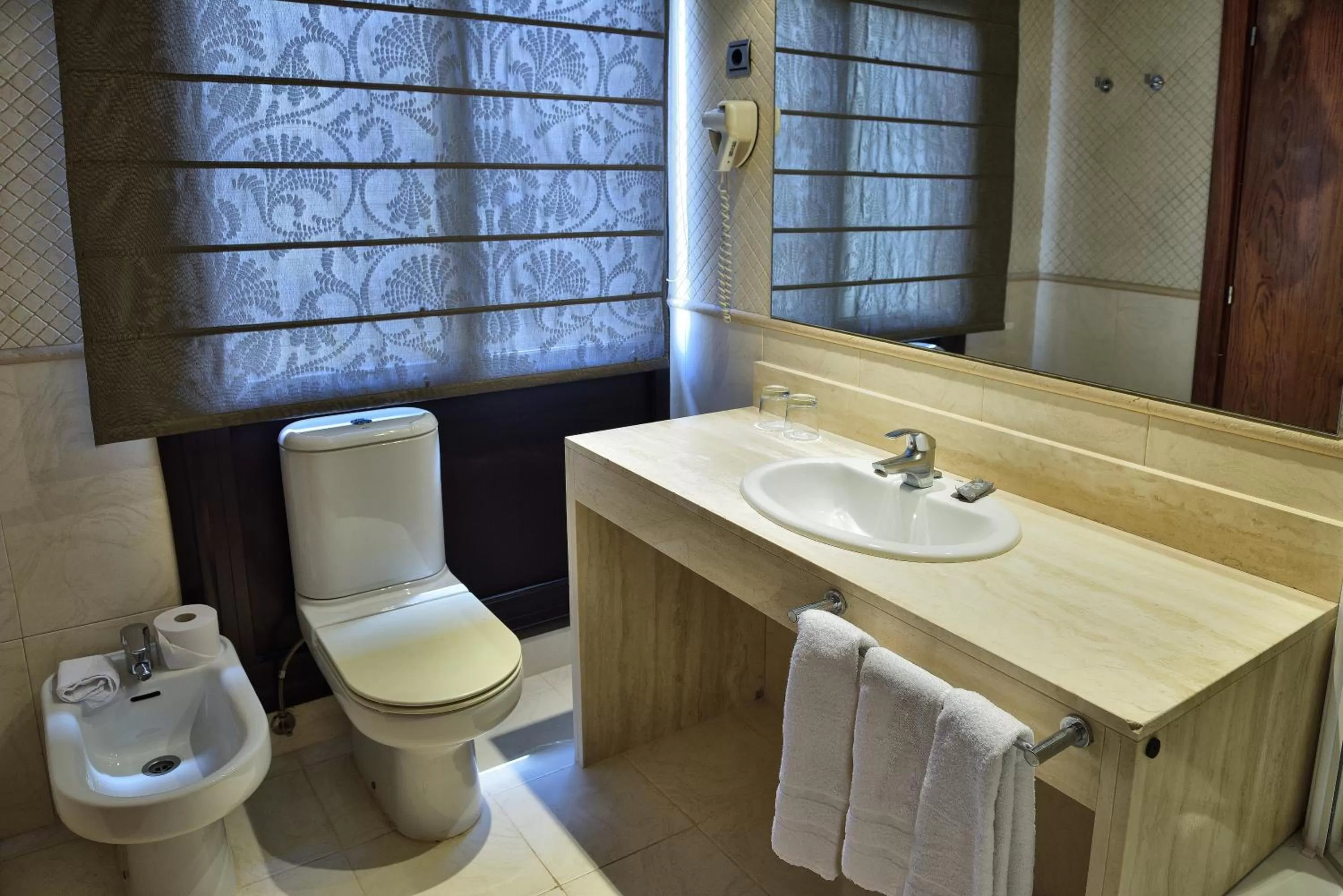 Bathroom in Hotel HLG CityPark Pelayo