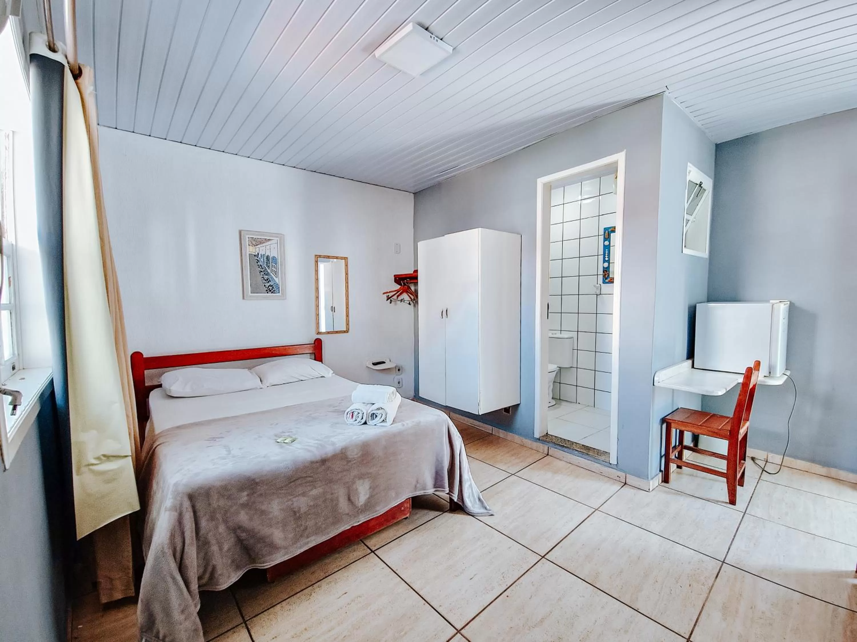 Bed in Pousada Água Marinha