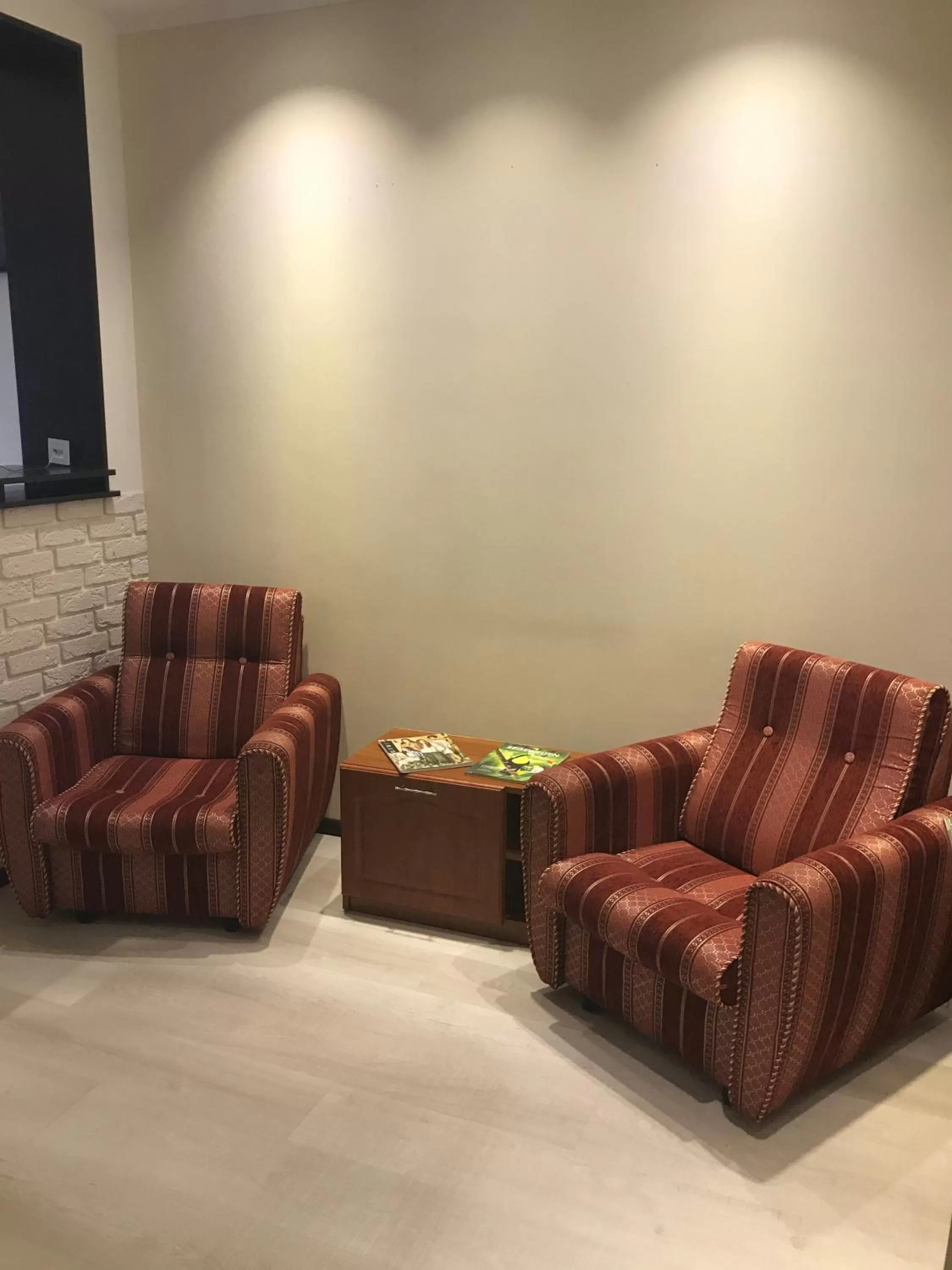 Seating area in VVP Club Hotel