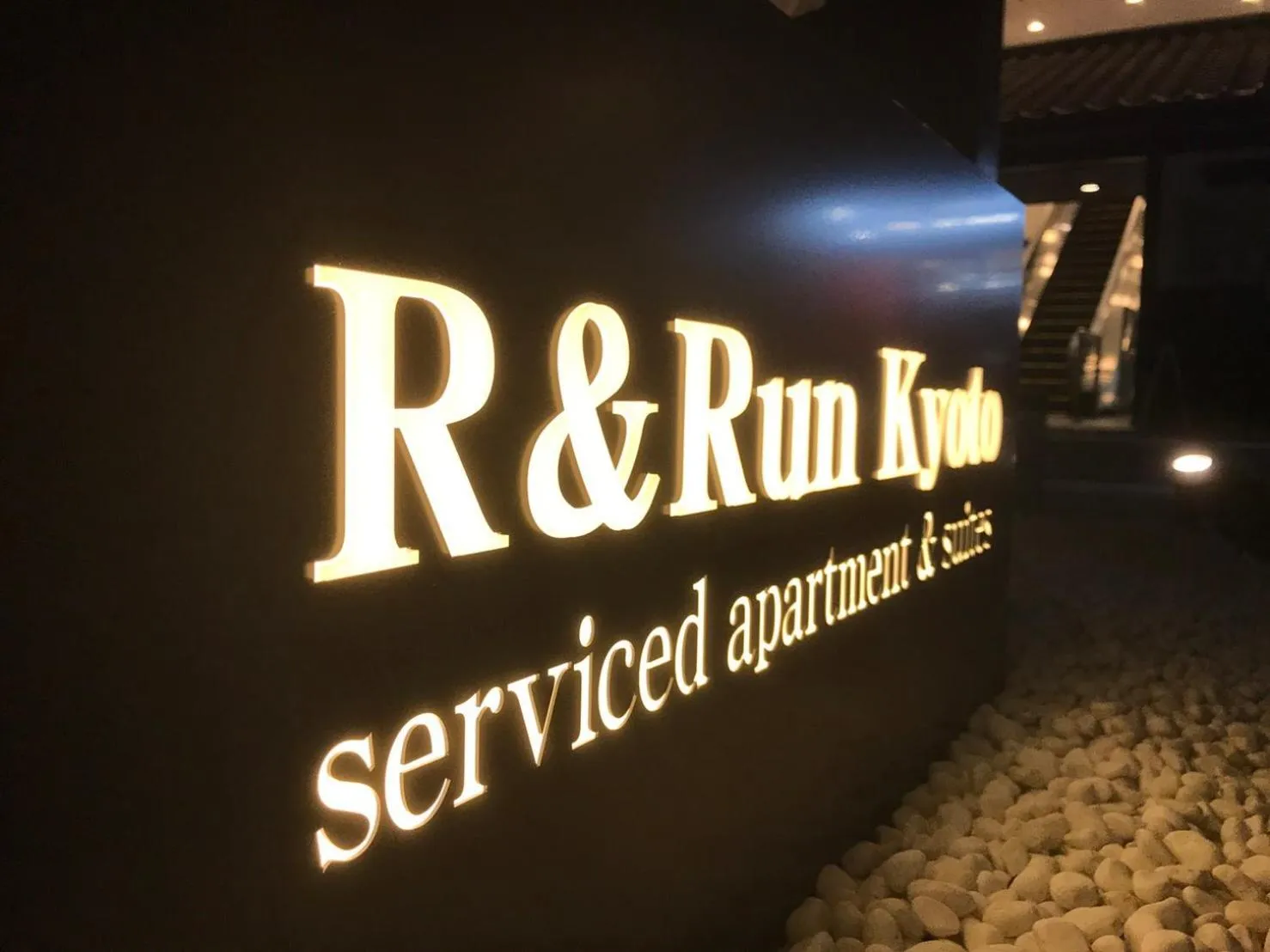 Property logo or sign in R&Run Kyoto Serviced Apartment & Suites