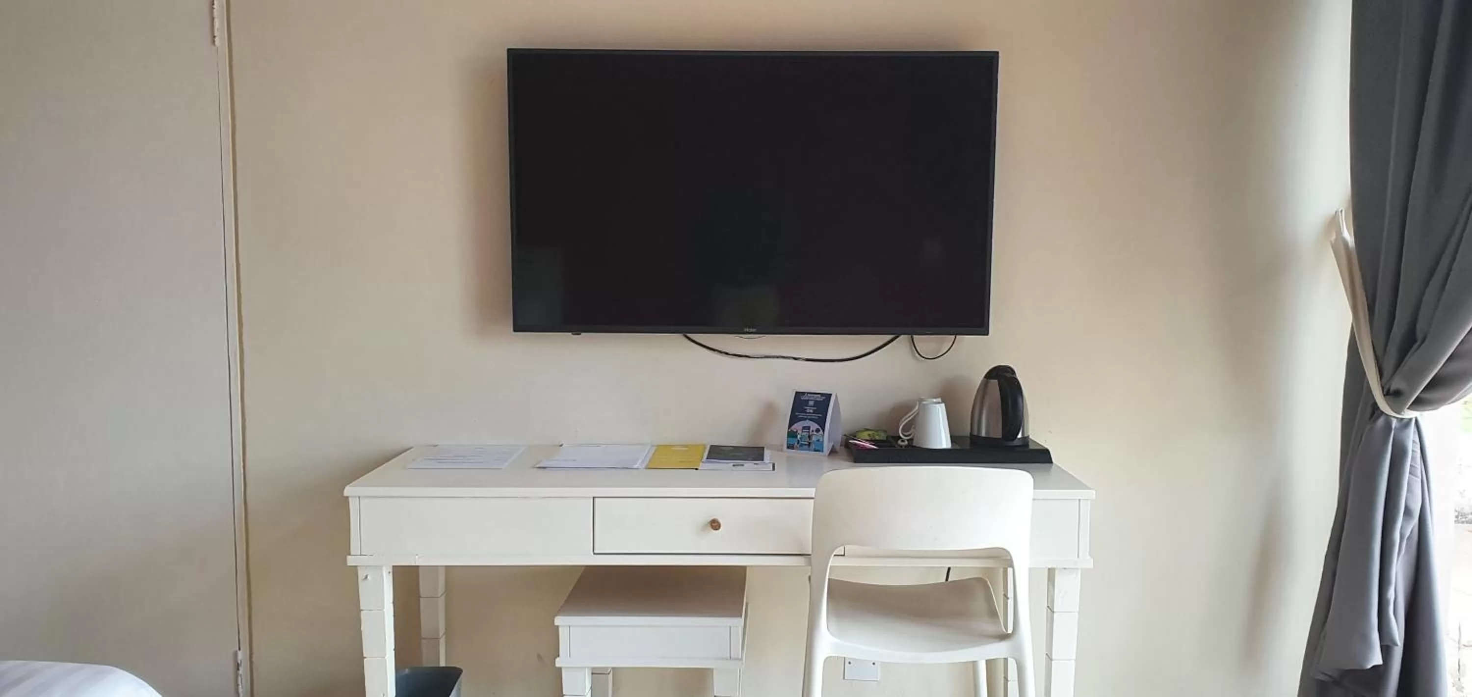 Photo of the whole room, TV/Entertainment Center in Golden Tulip Grande Comore Moroni Resort & Spa