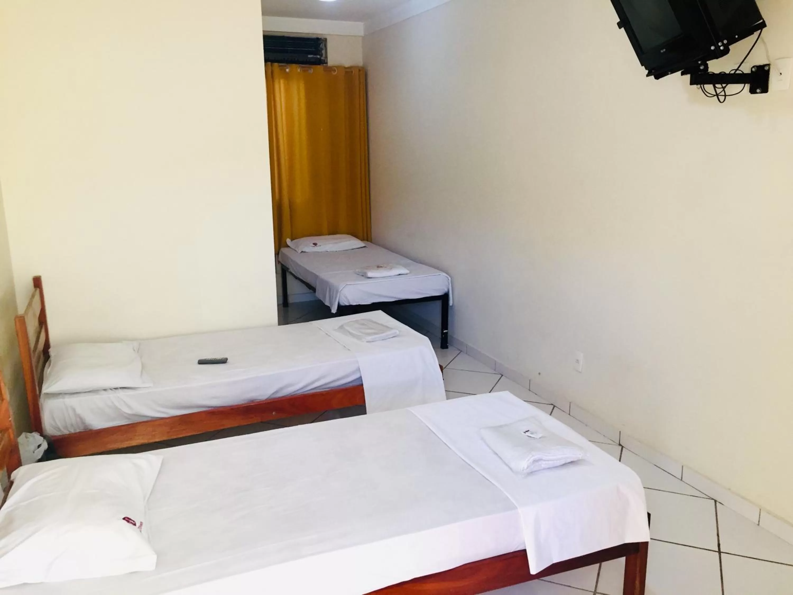 Bed in Hotel Oliveira