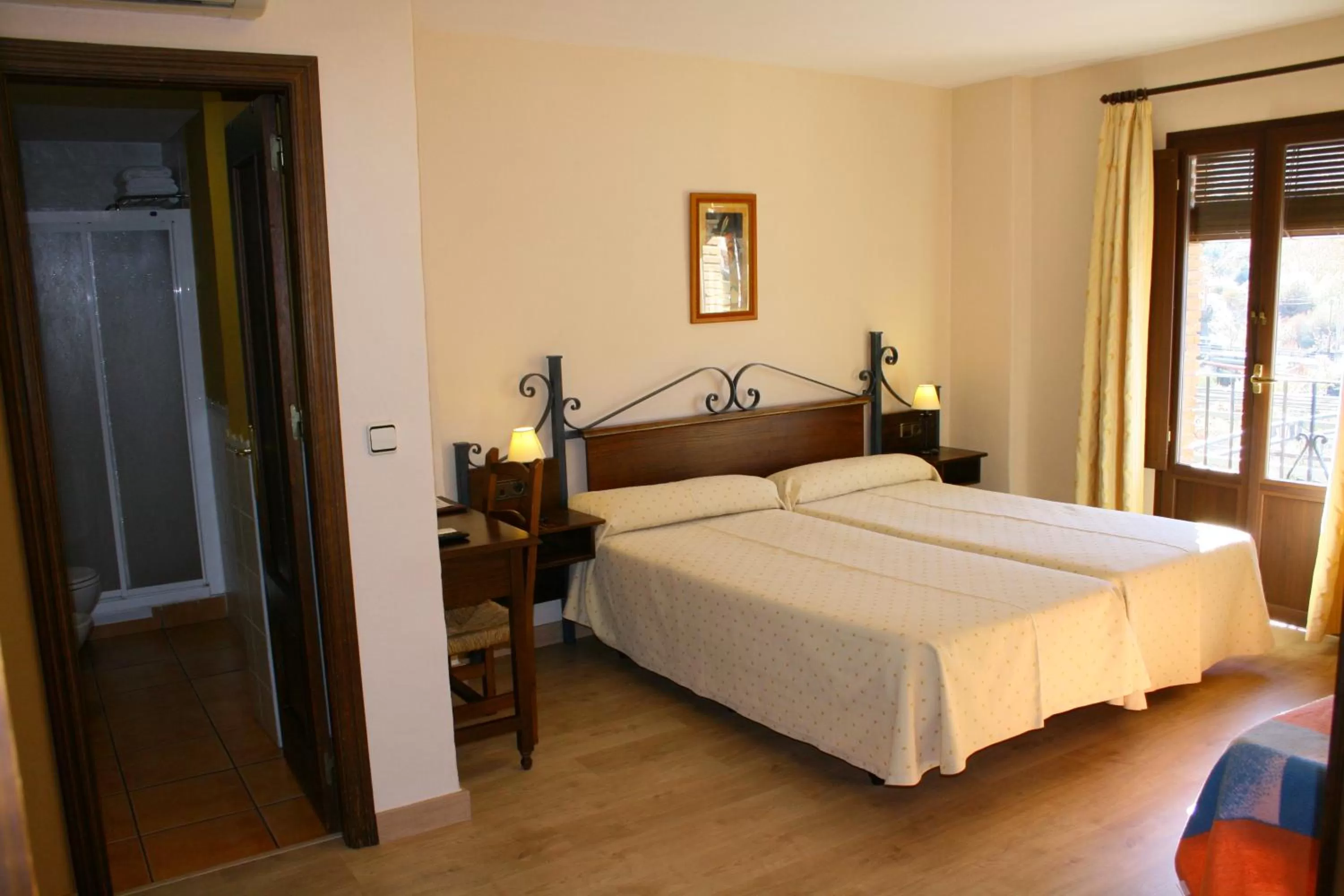 Photo of the whole room, Bed in Hotel Rural Huerta del Laurel