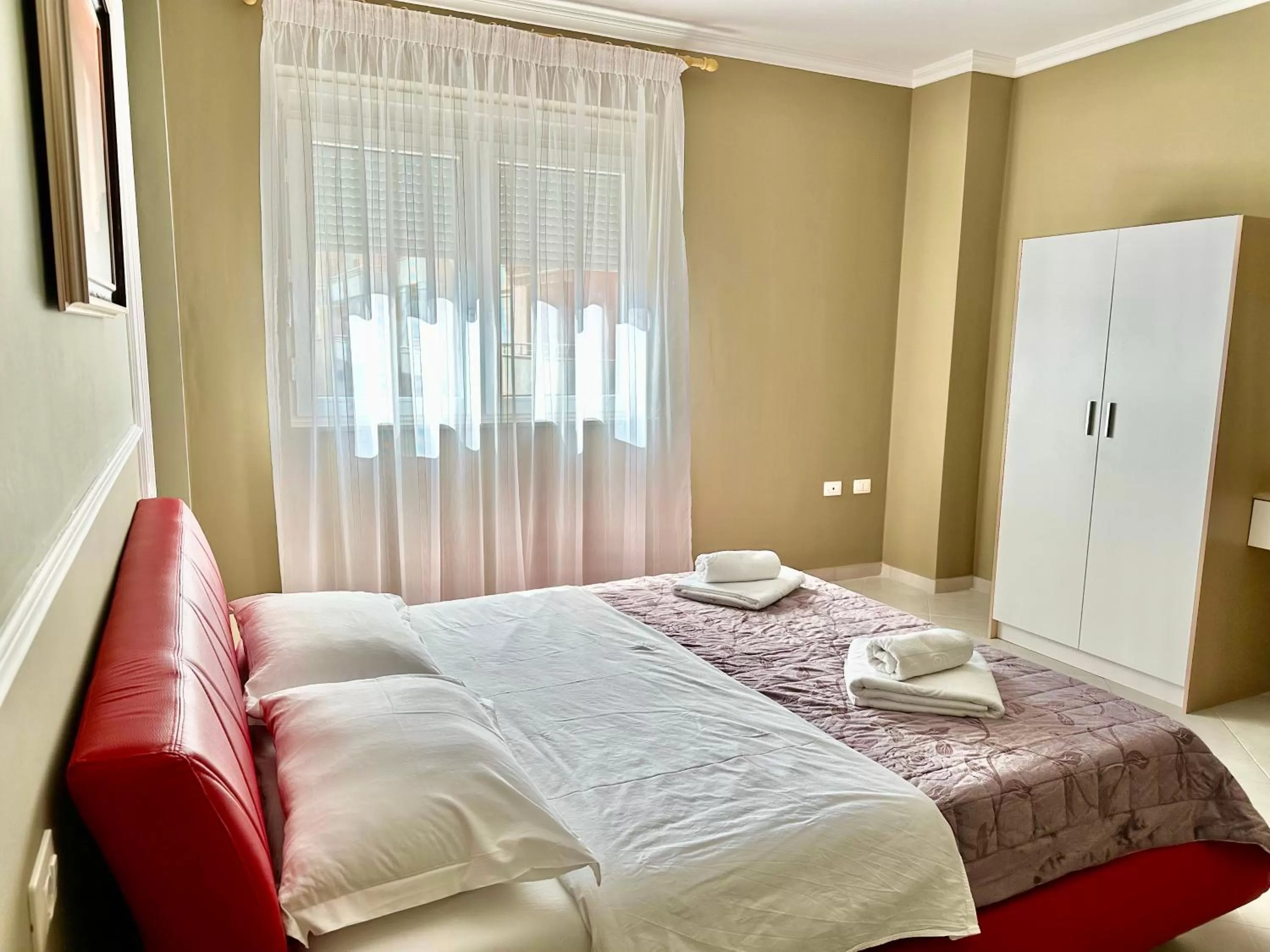 Bed in FAMILY SUITE RESIDENCE