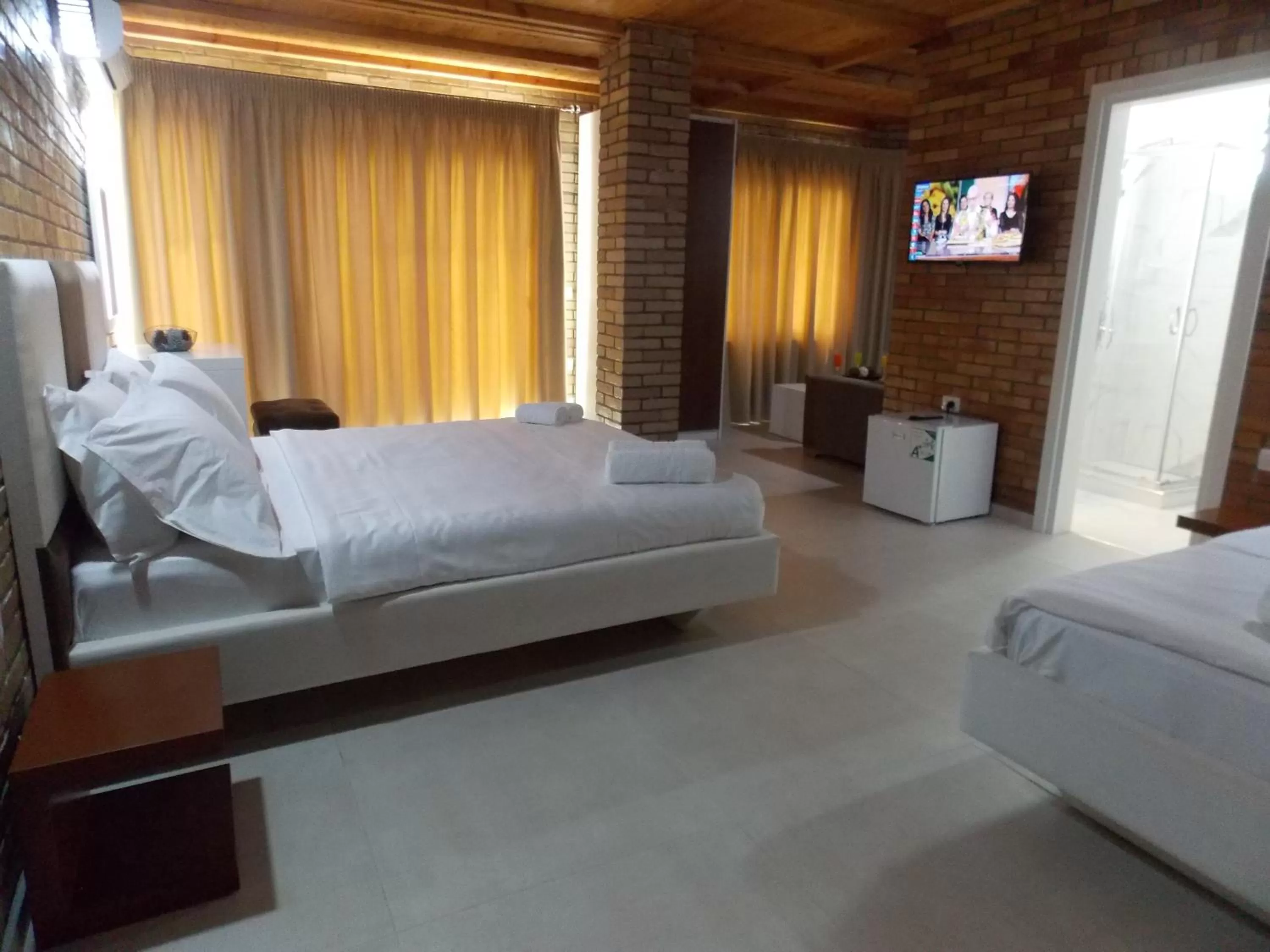 TV and multimedia, Bed in Hotel Piccolino