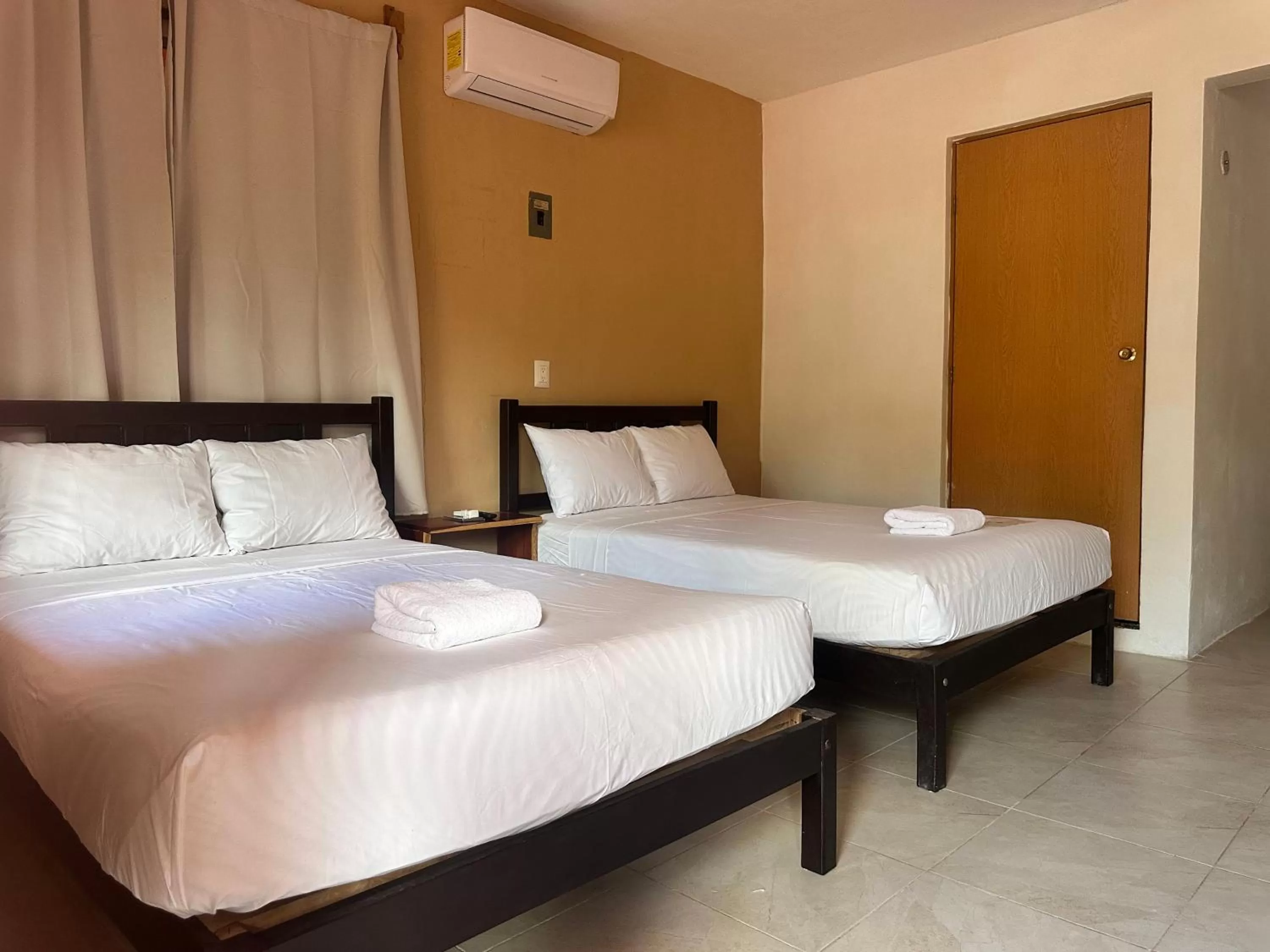 Bed in Hotel Bacalar Sunshine