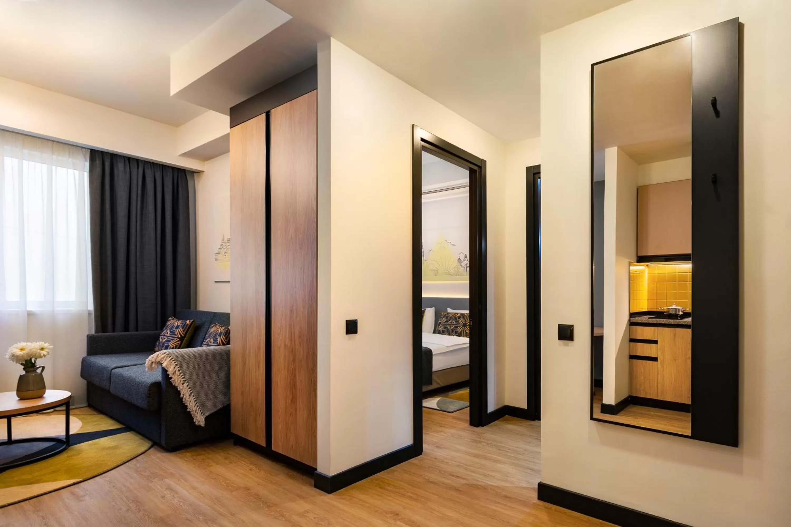 Living room, Bed in Citadines City Centre Tbilisi