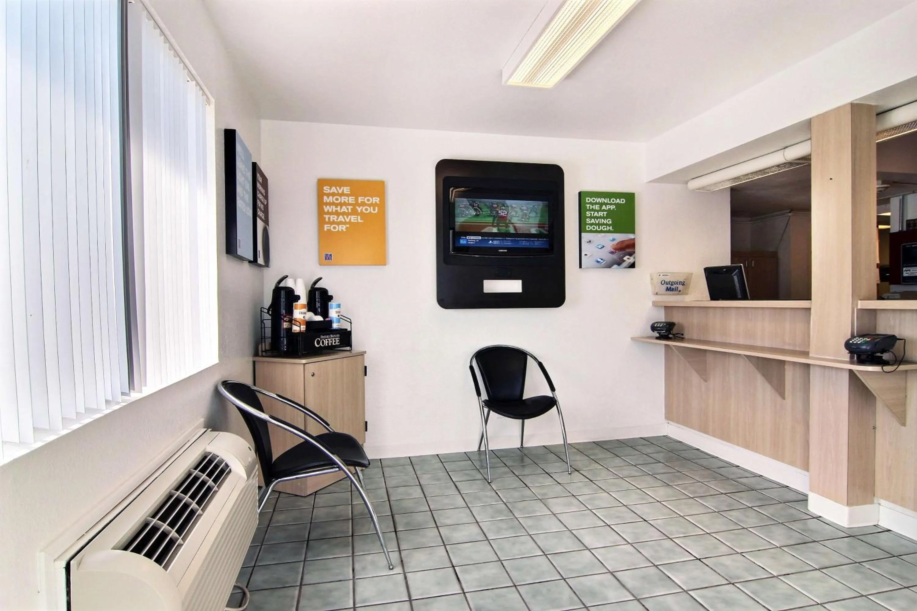 Communal lounge/ TV room in Motel 6-San Angelo, TX