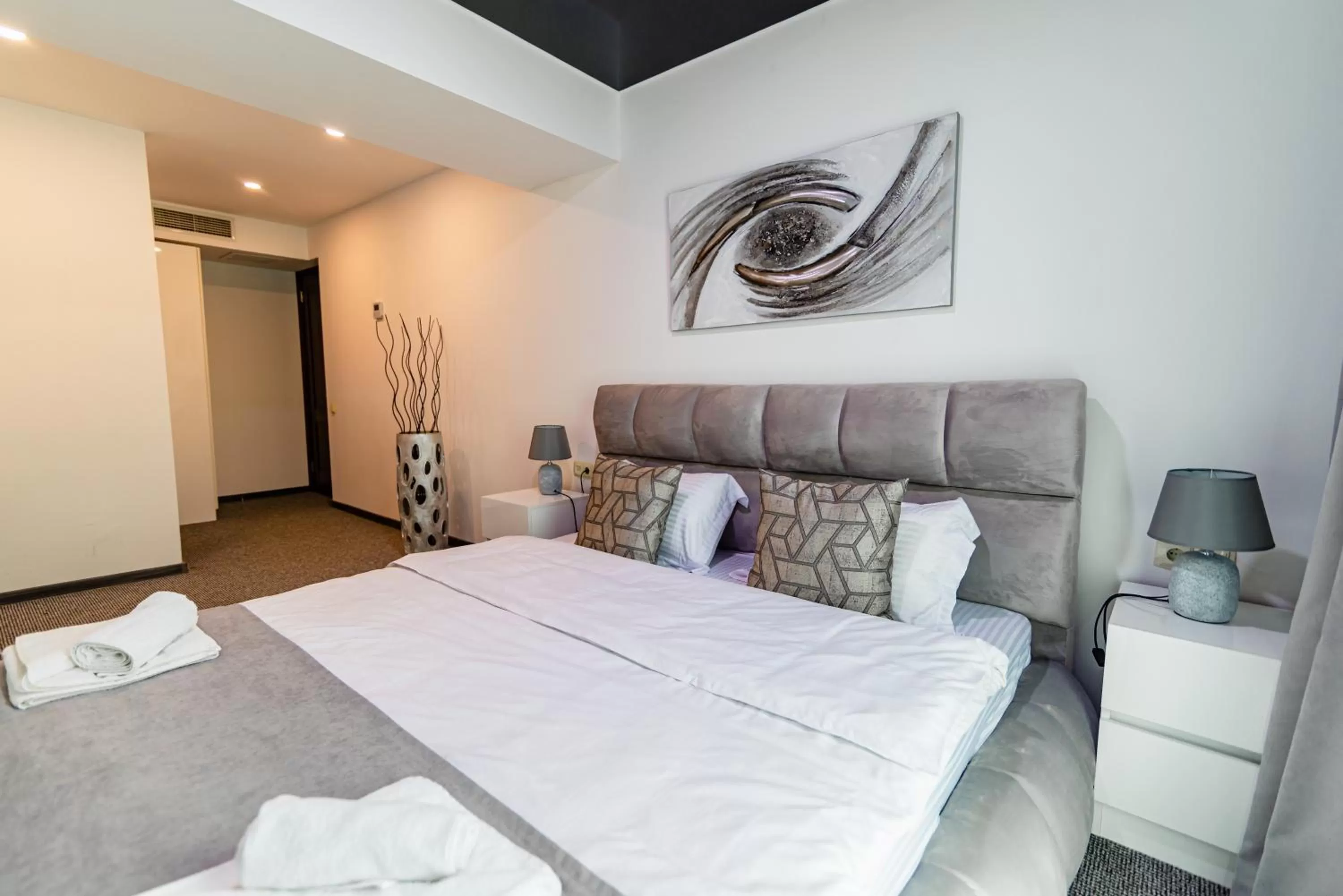 Bed in Royal Plaza Hotel