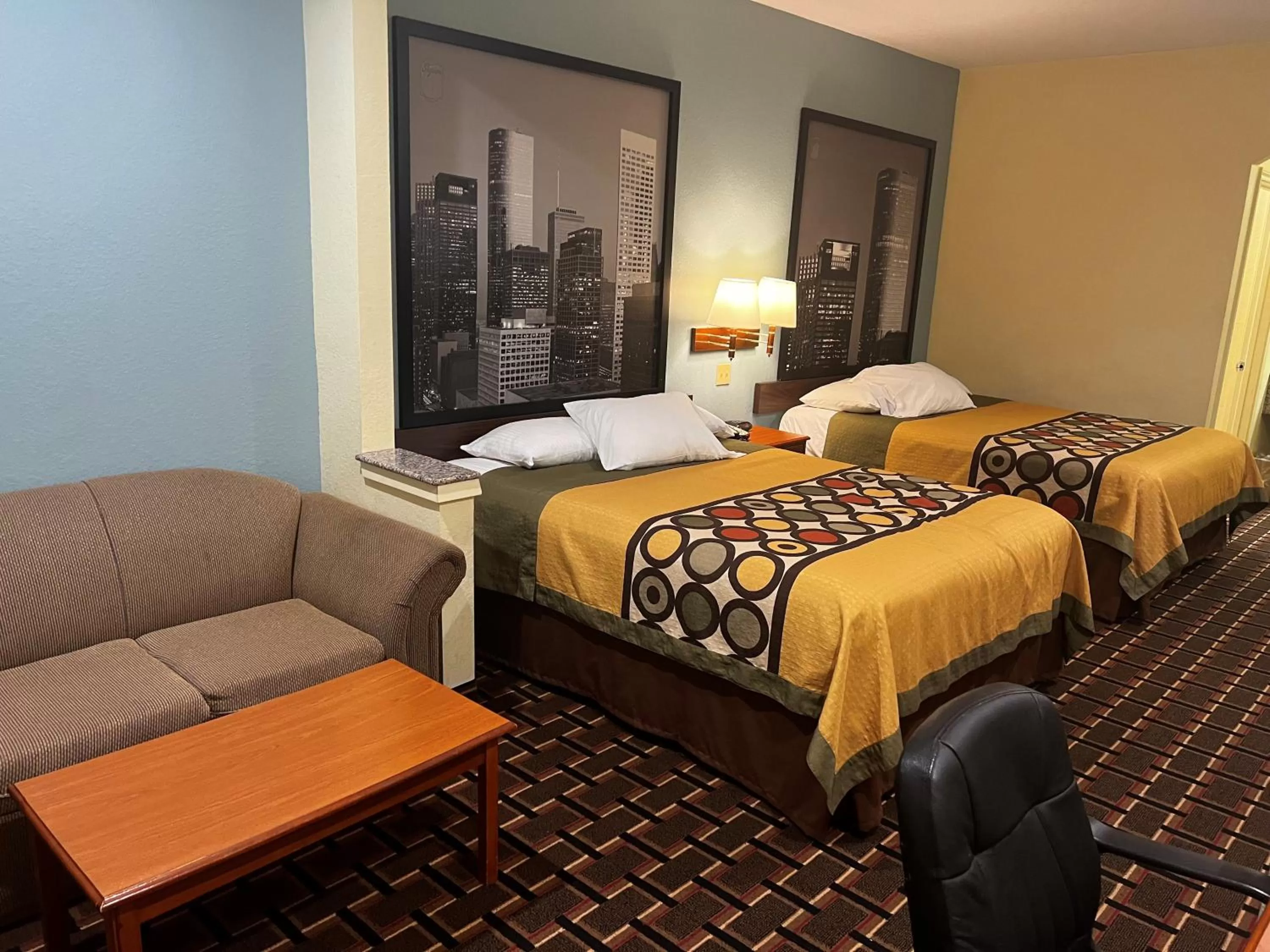 Bedroom, Bed in Super 8 by Wyndham Stafford Sugarland Area