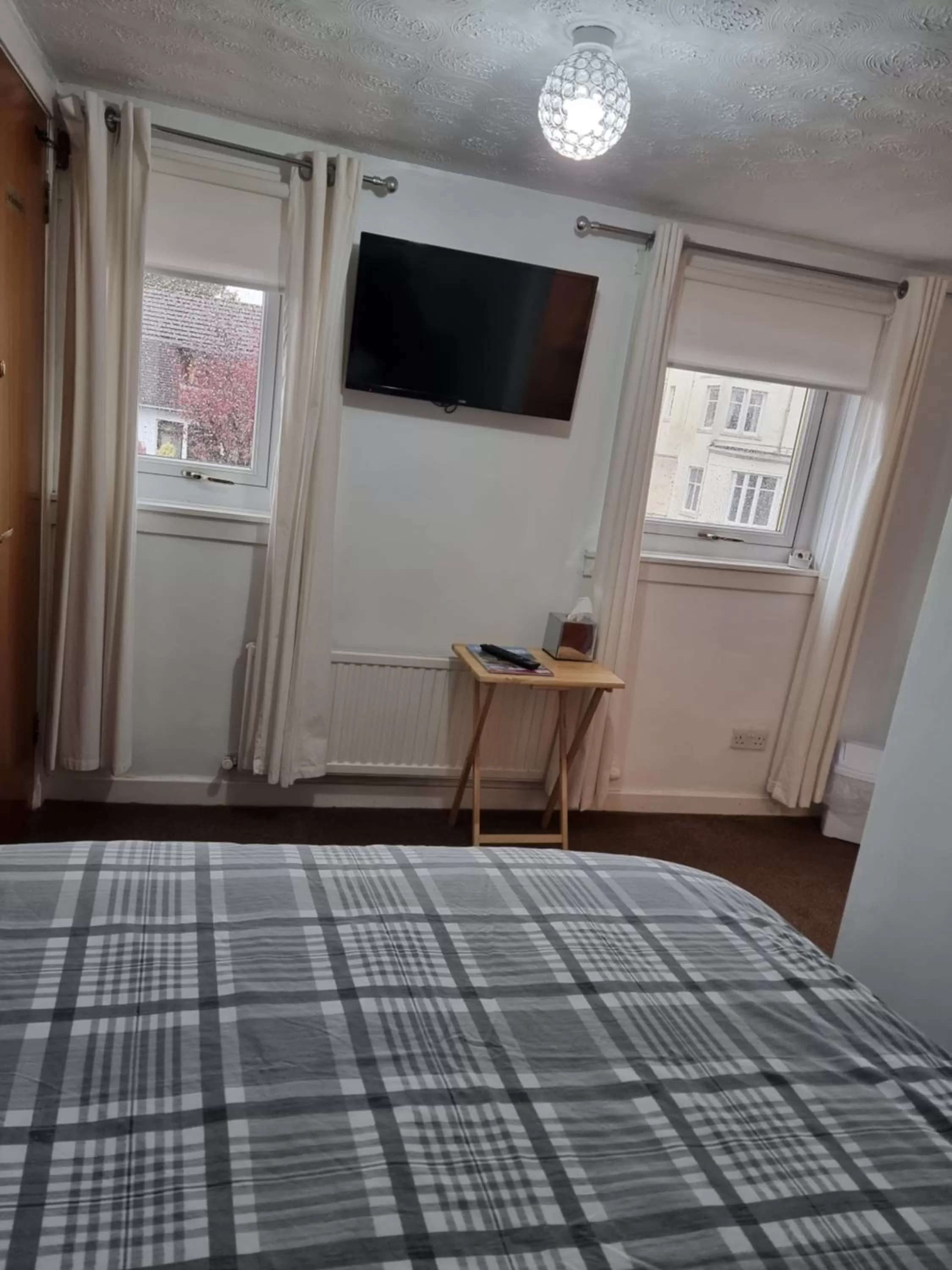 Bed in Glenfern Guest House and a separate Cottage with its own private hot tub