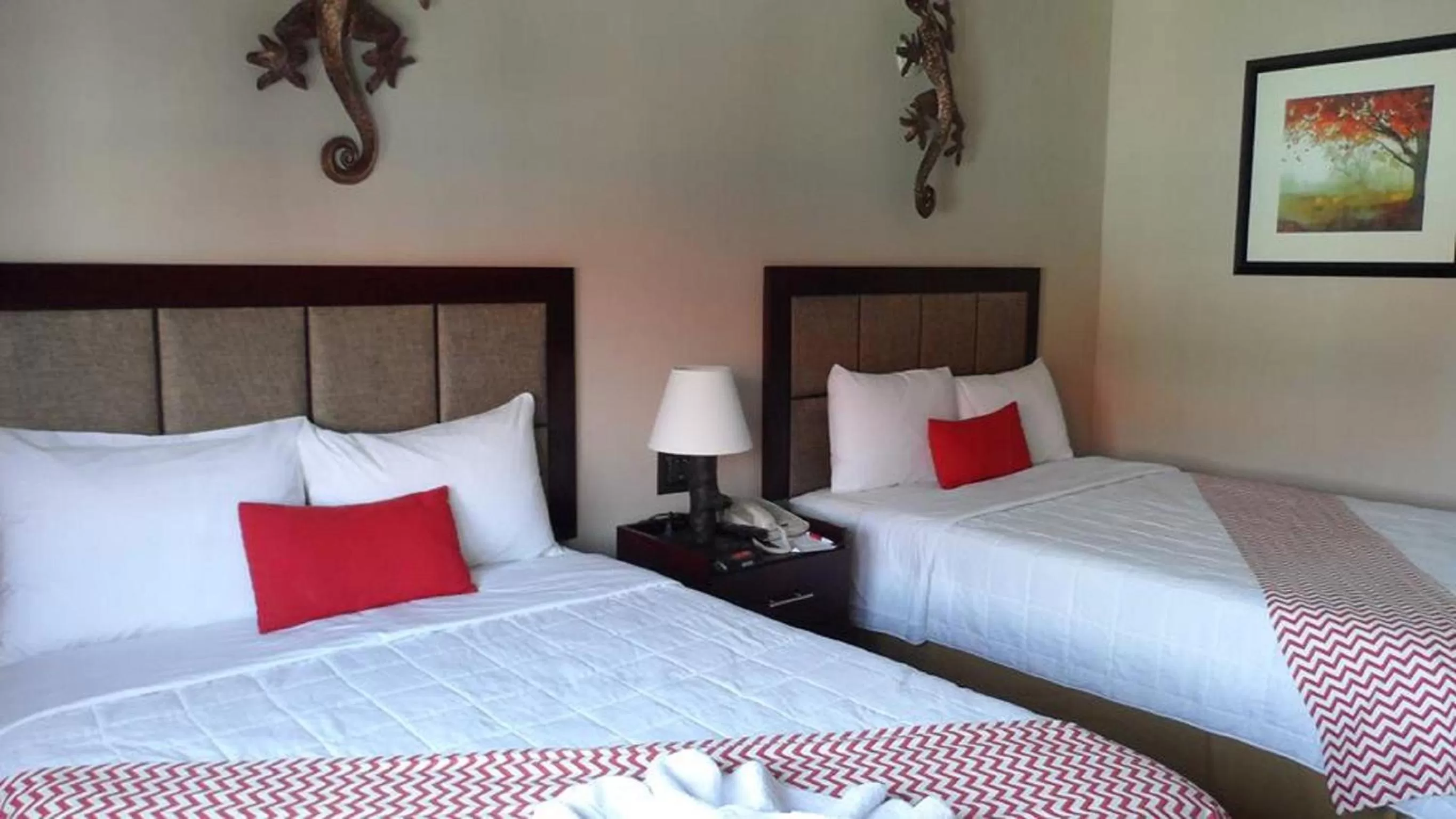 Photo of the whole room, Bed in Ramada by Wyndham Tikal Isla de Flores