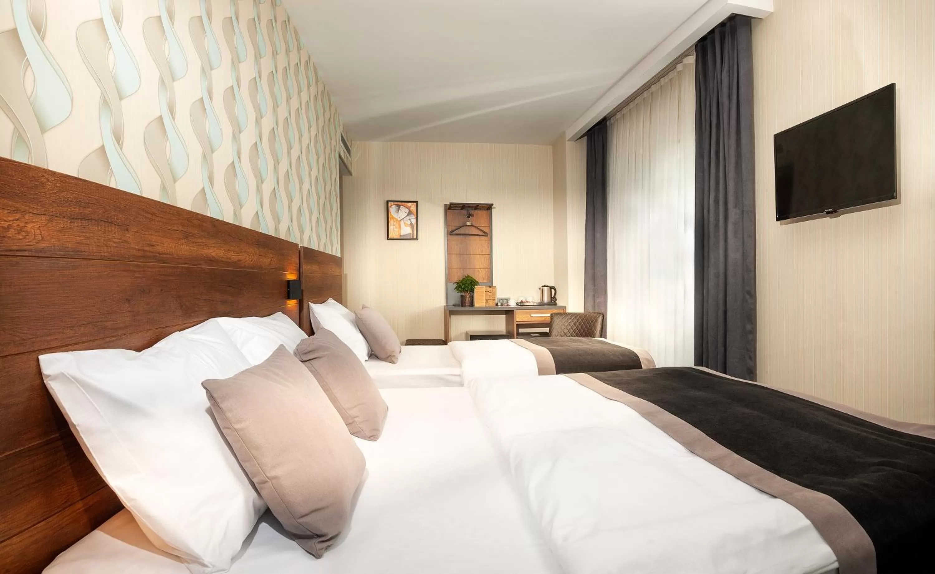 Bed in Hotel Bossuite Business