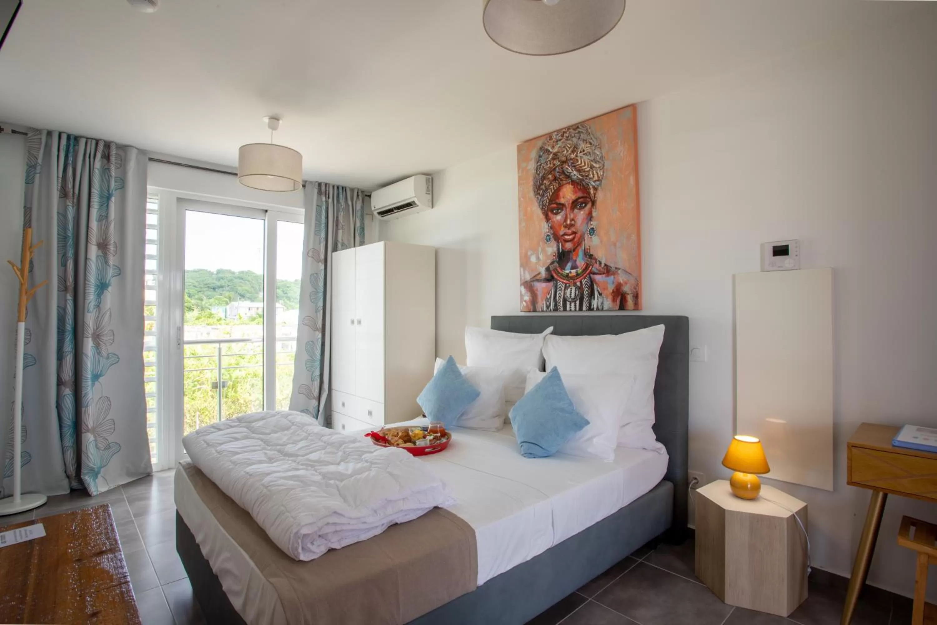 Bed in Hôtel Guadeloupe Palm Suites