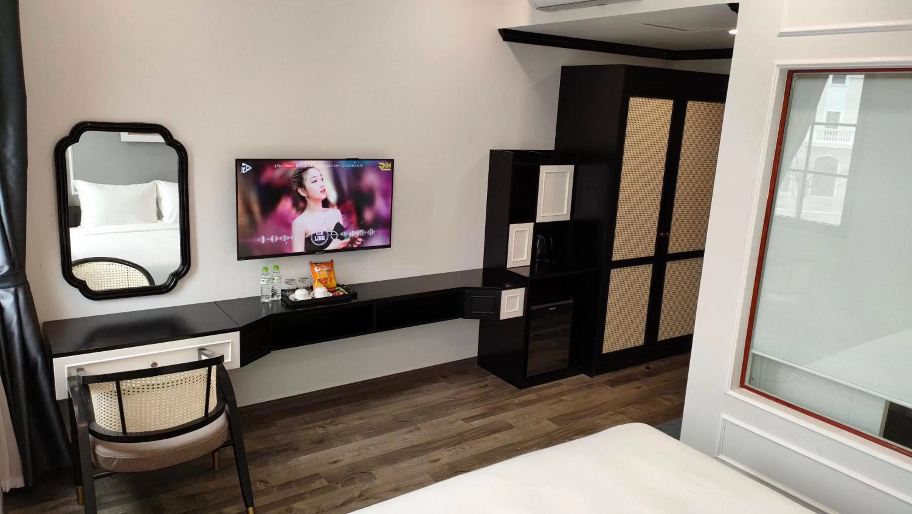 Communal lounge/ TV room, Bed in Halong Lavender Hotel