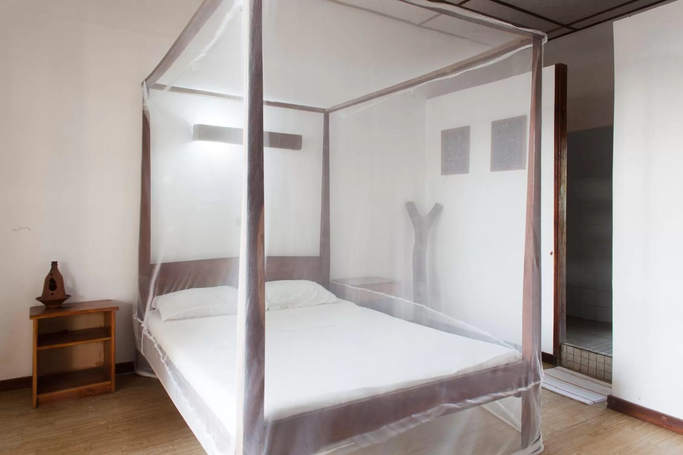 Bed in Auberge de Grand Popo