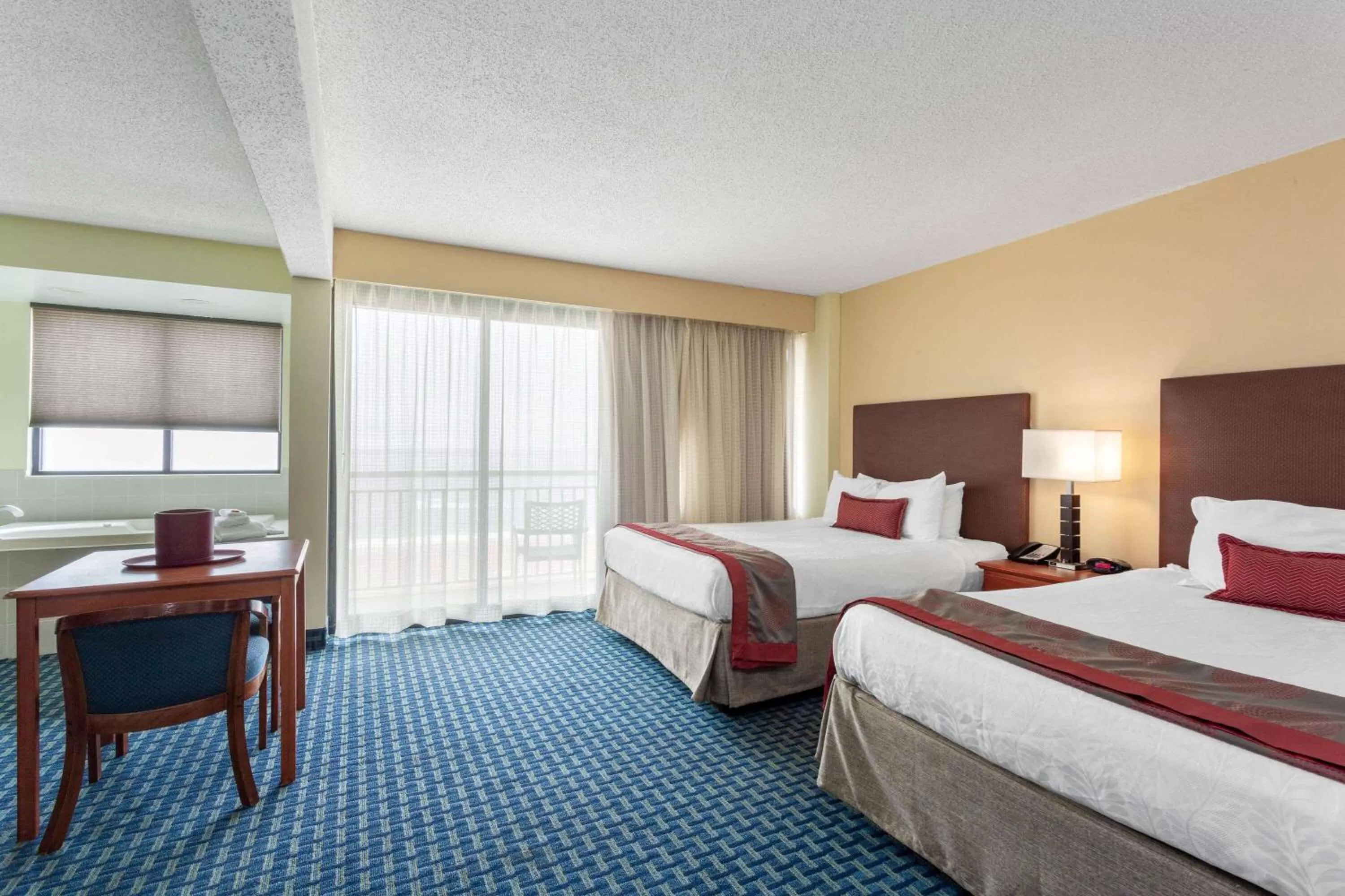 Photo of the whole room, Bed in Ramada Plaza by Wyndham Virginia Beach Oceanfront