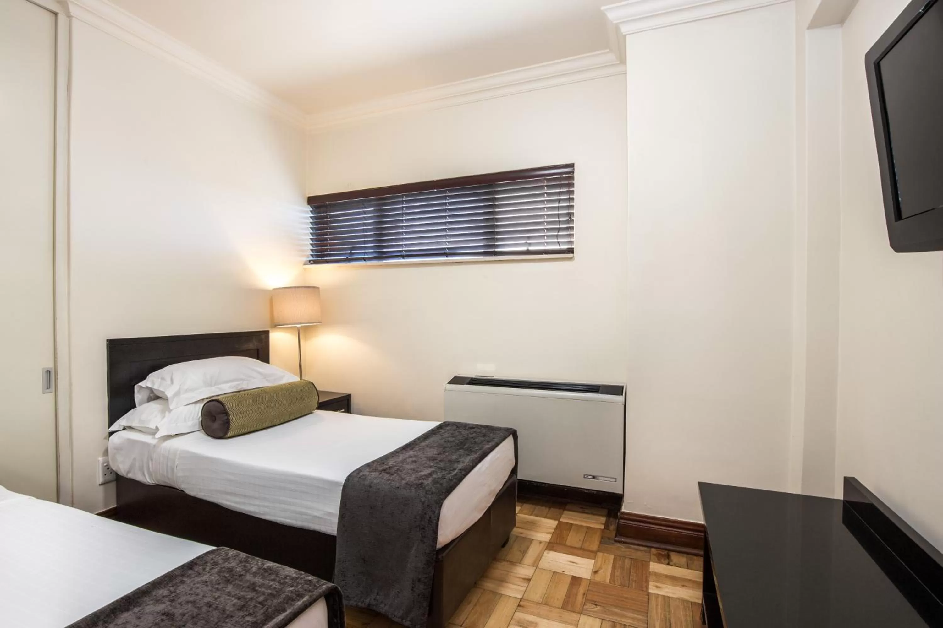 Bedroom, Bed in Belaire Suites Hotel