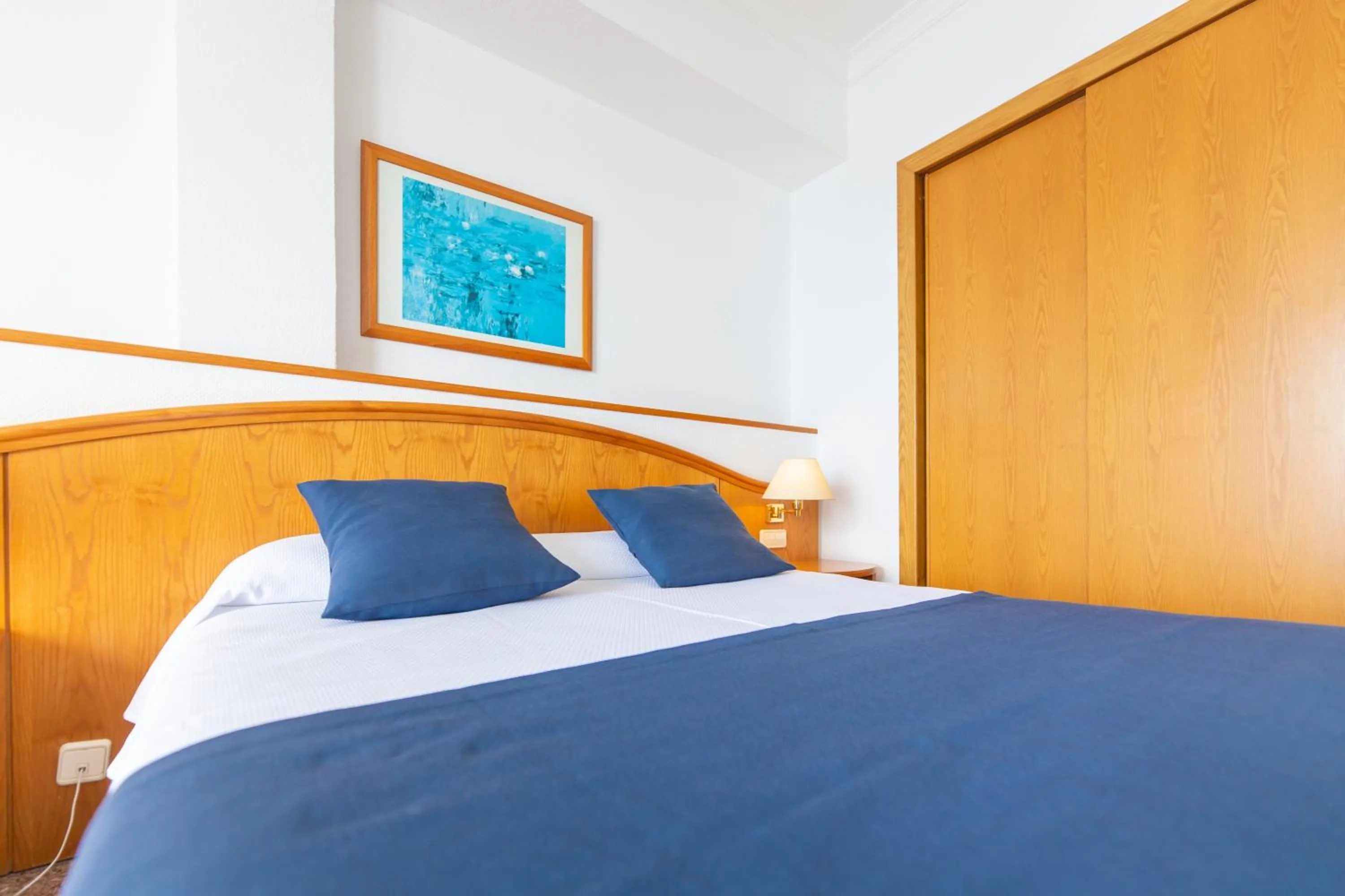 Bed in Hotel Ramblamar