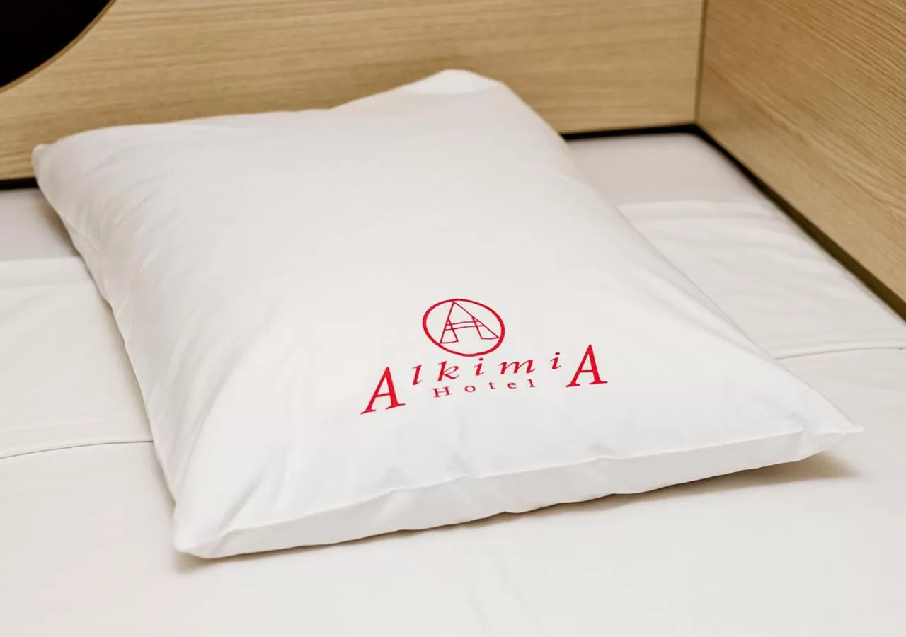 Bed in Alkimia Hotel