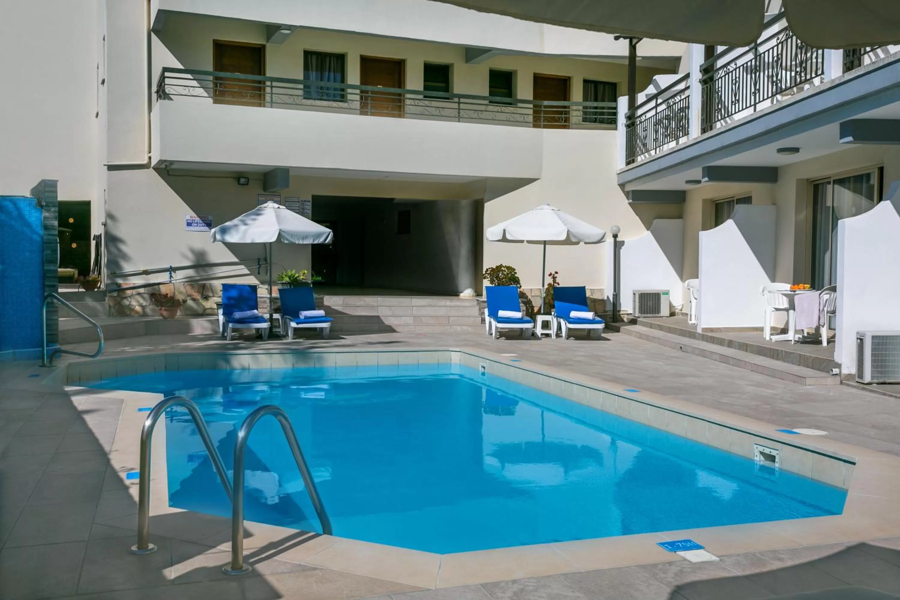 Swimming pool in Crystallo Apartments