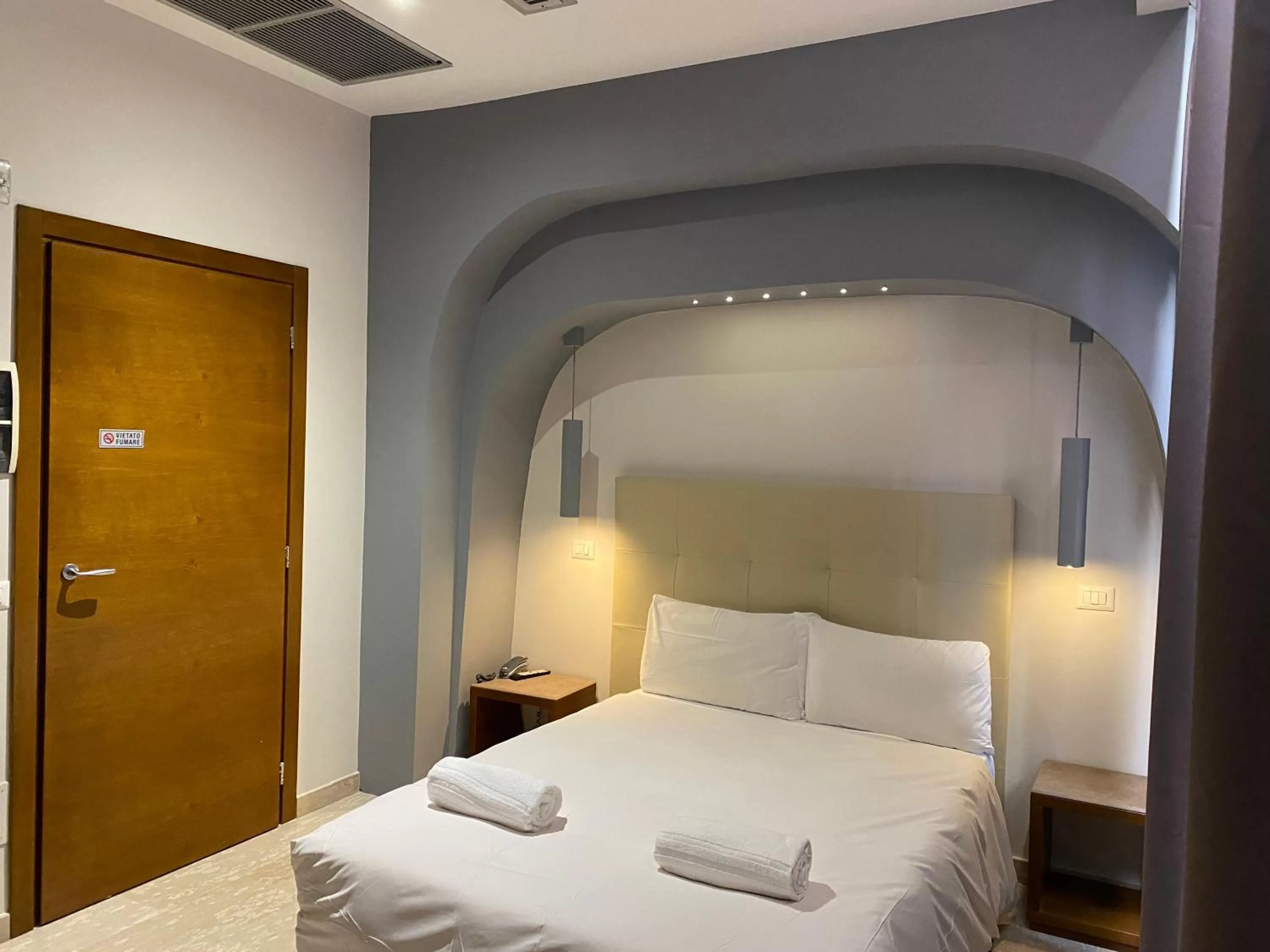 Bedroom, Bed in Oasi Village Hotel