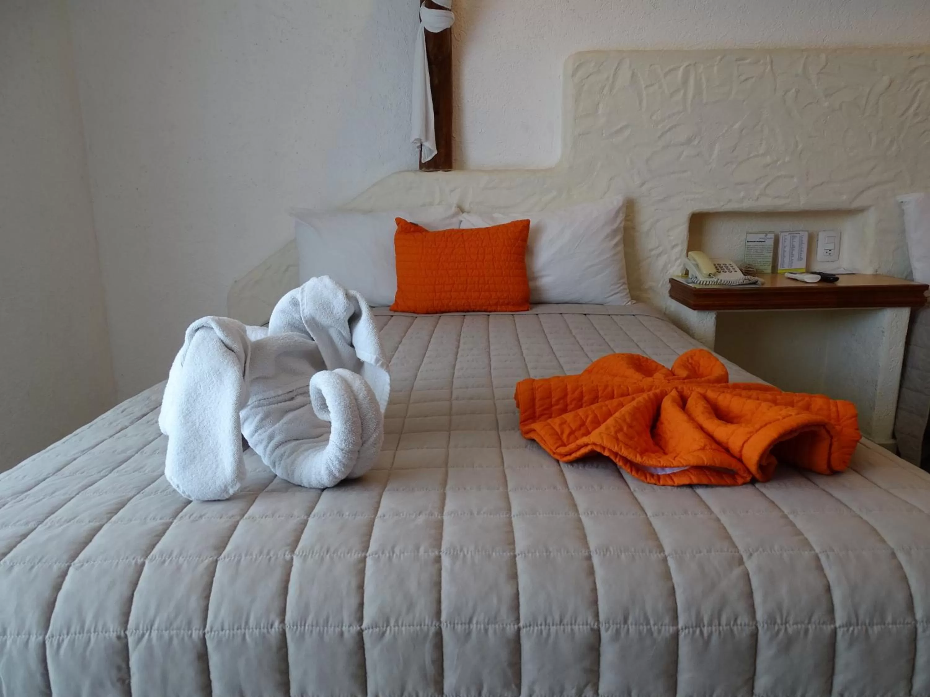 Bed in Hotel Palapa Palace