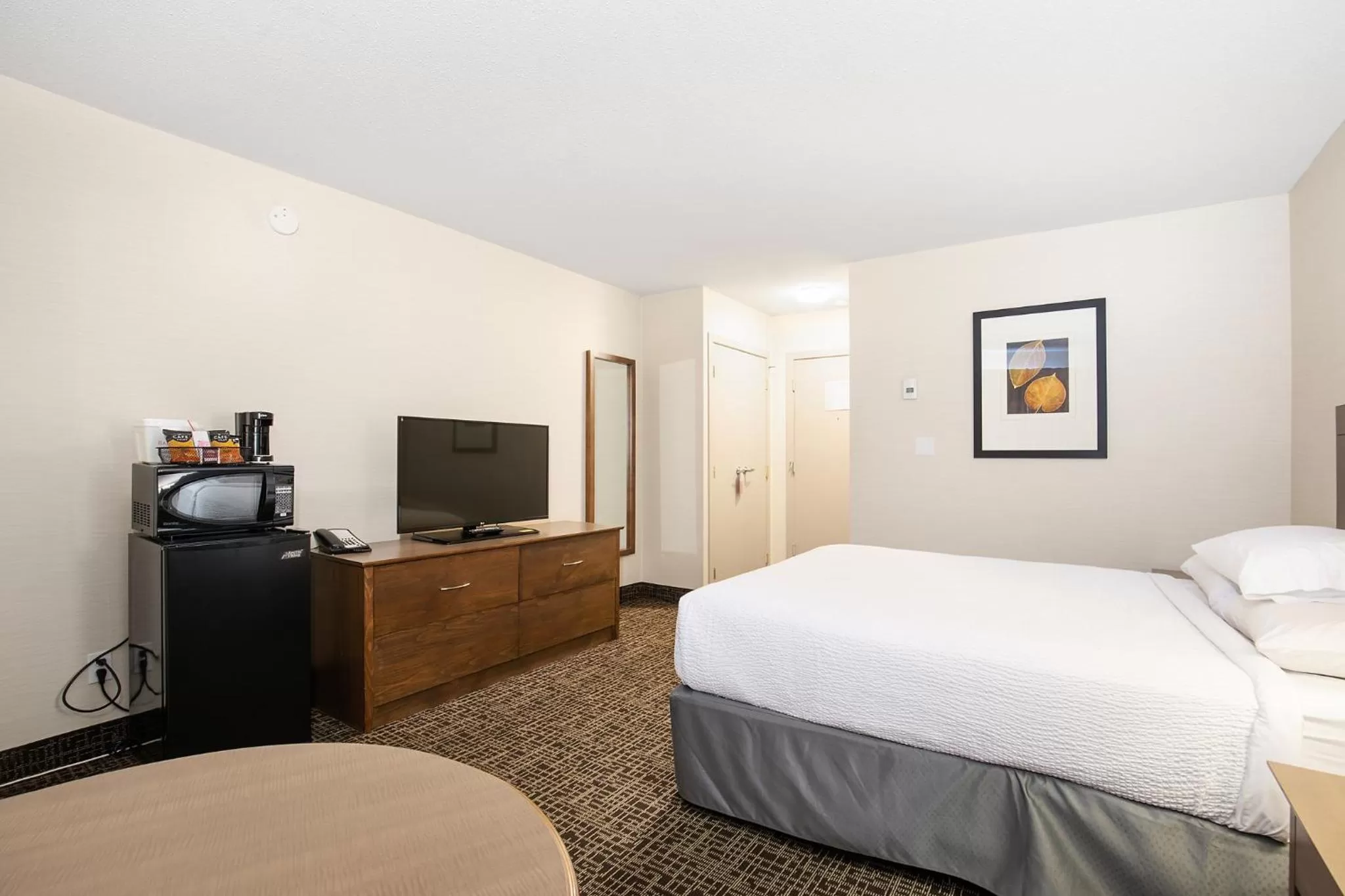 Bed in Ramada by Wyndham Kamloops