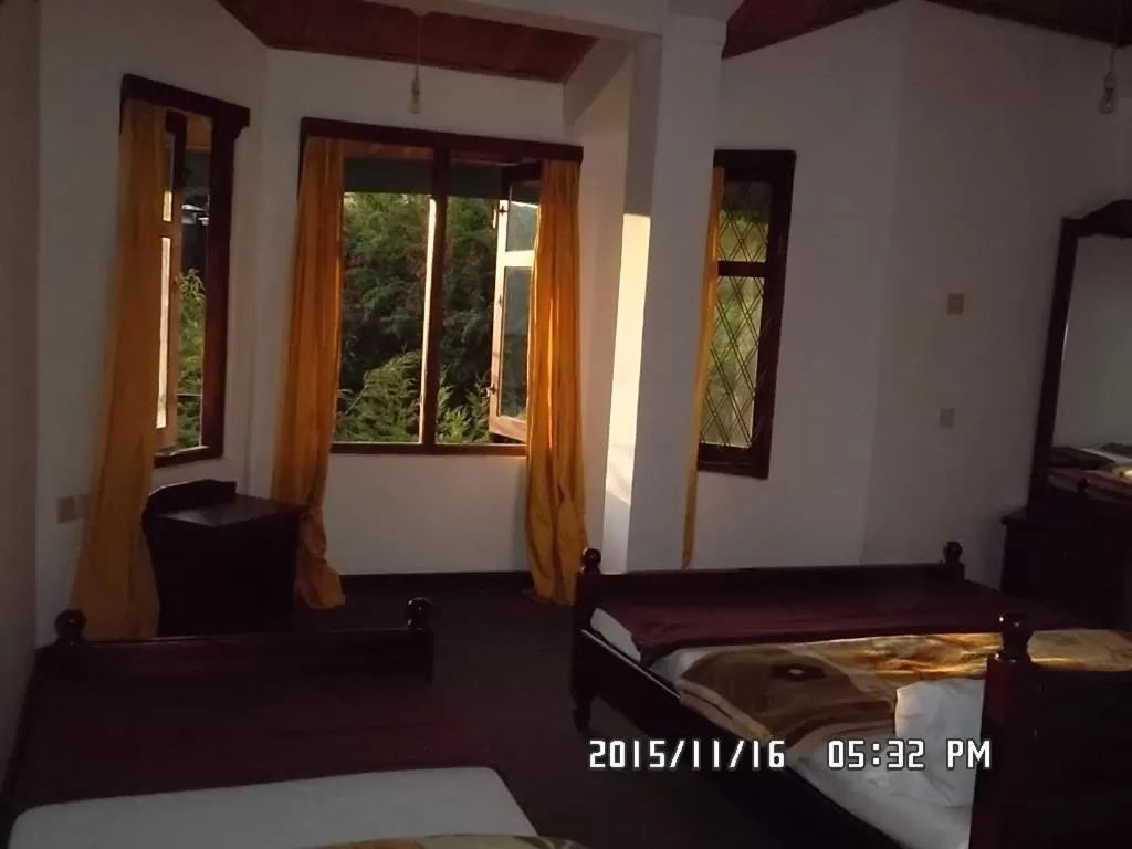 Bed in Panorama Accommodations Nuwara Eliya