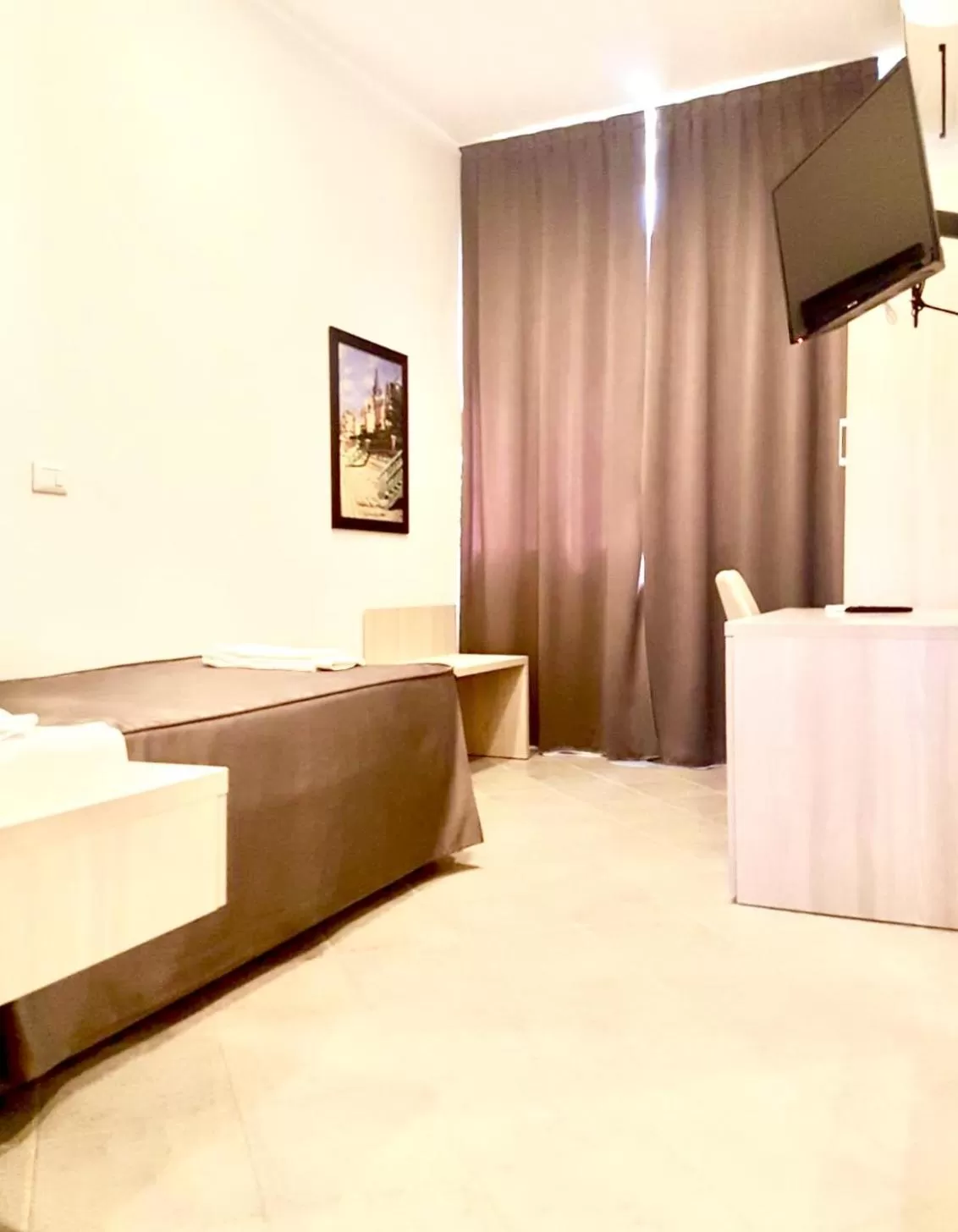 Bed in Academy Hotel