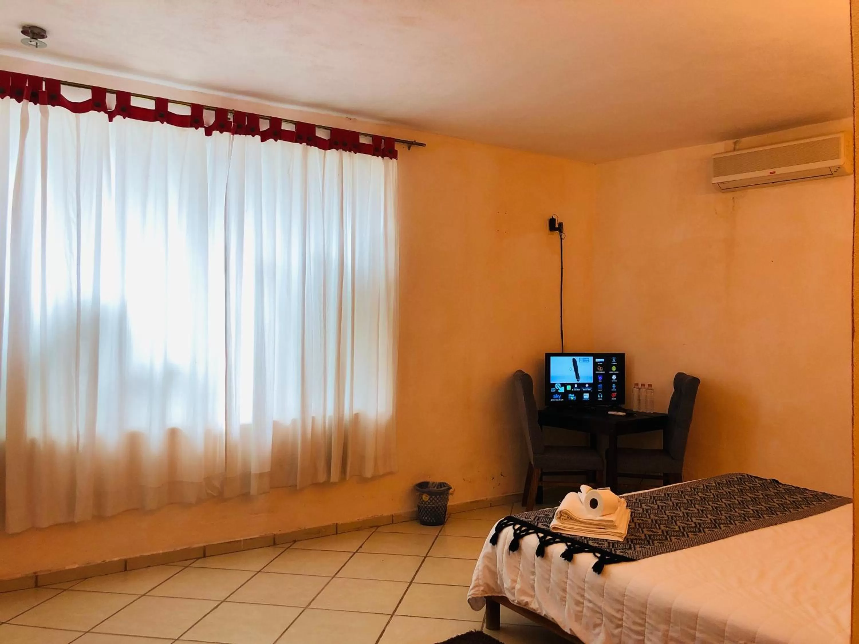 Bed in Hotel Camino Surreal Xilitla