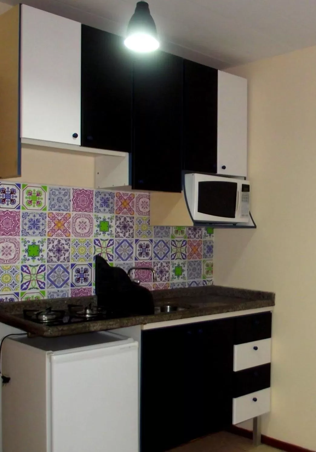 Kitchen or kitchenette in Dom Pedrito Apart Hotel